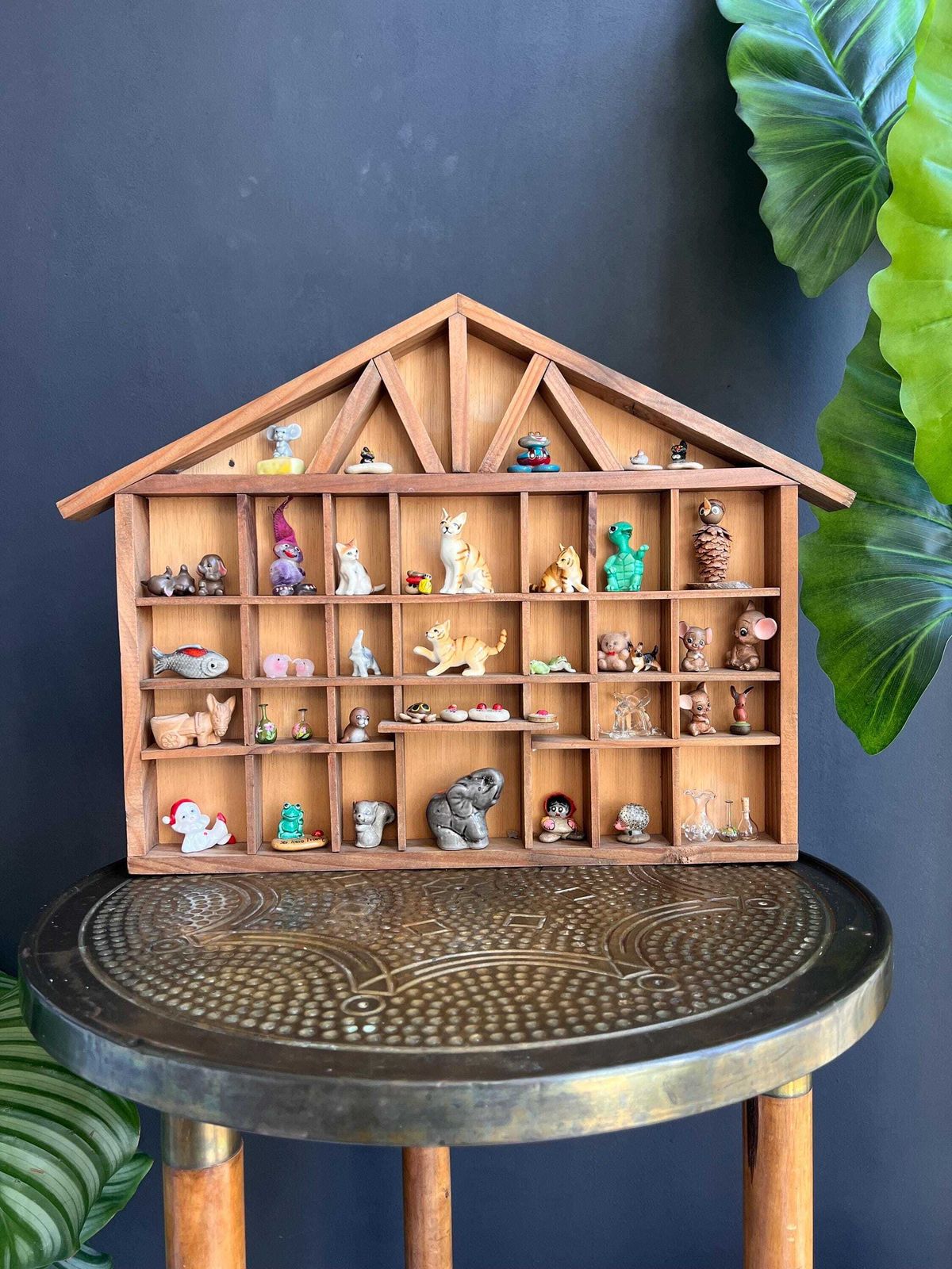 Vintage Curios Cabinet Filled With Miniature Figurines photo vintage