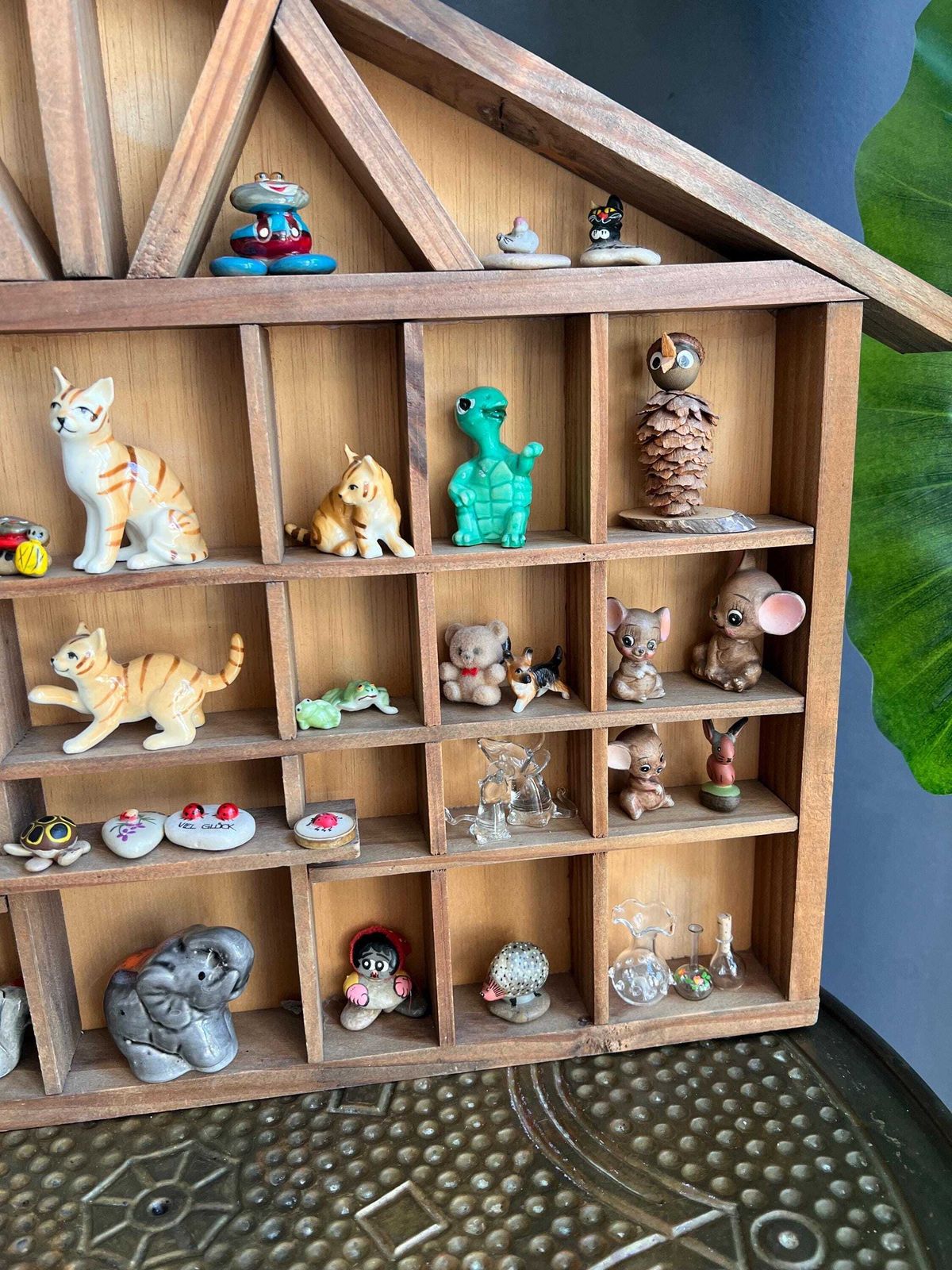 photo buy Vintage Curios Cabinet Filled With Miniature Figurines