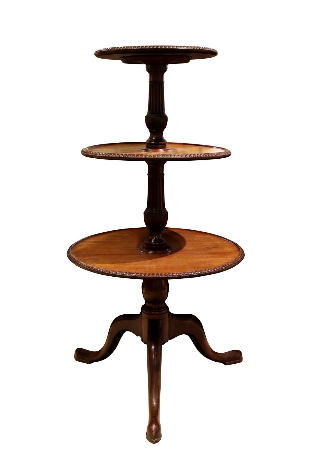 An Elegant Regency Mahogany Revolving Dumb Waiter, Circa 1820.
