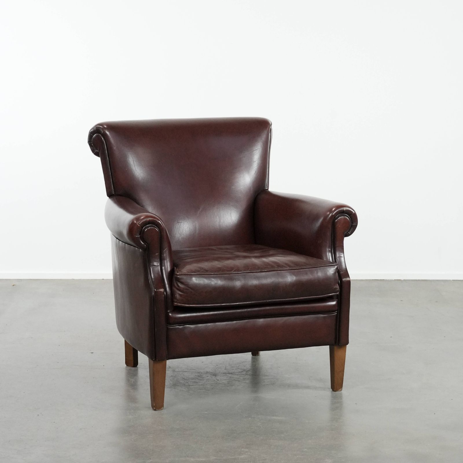 Dark Luxurious Sheepskin Armchair With A Timeless Look