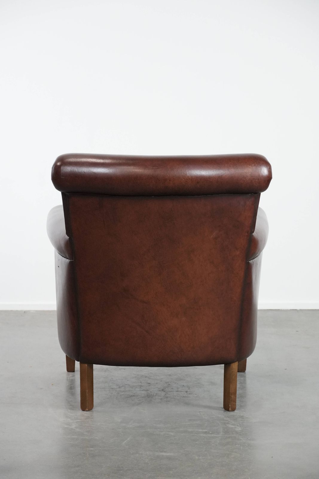Dark Luxurious Sheepskin Armchair With A Timeless Look photo Furniture