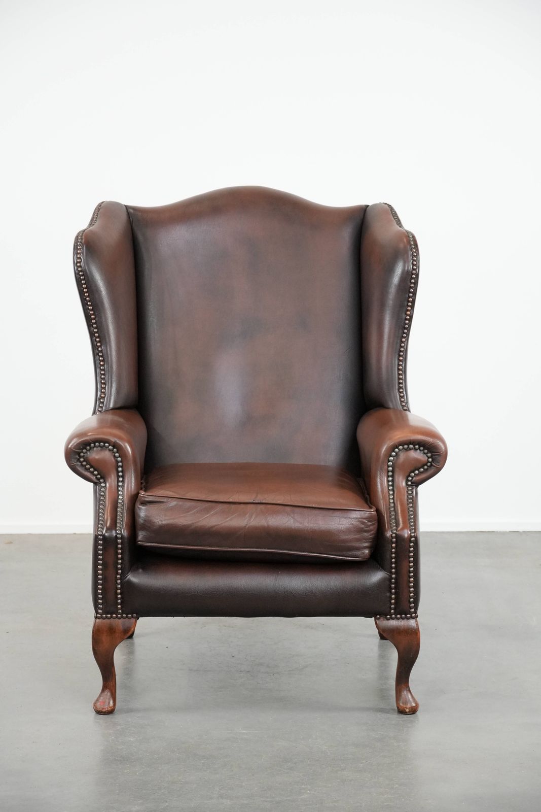 Nice Brown Smooth Cowhide Chesterfield Armchair In English Style Finished With Decorative Nails photo furniture