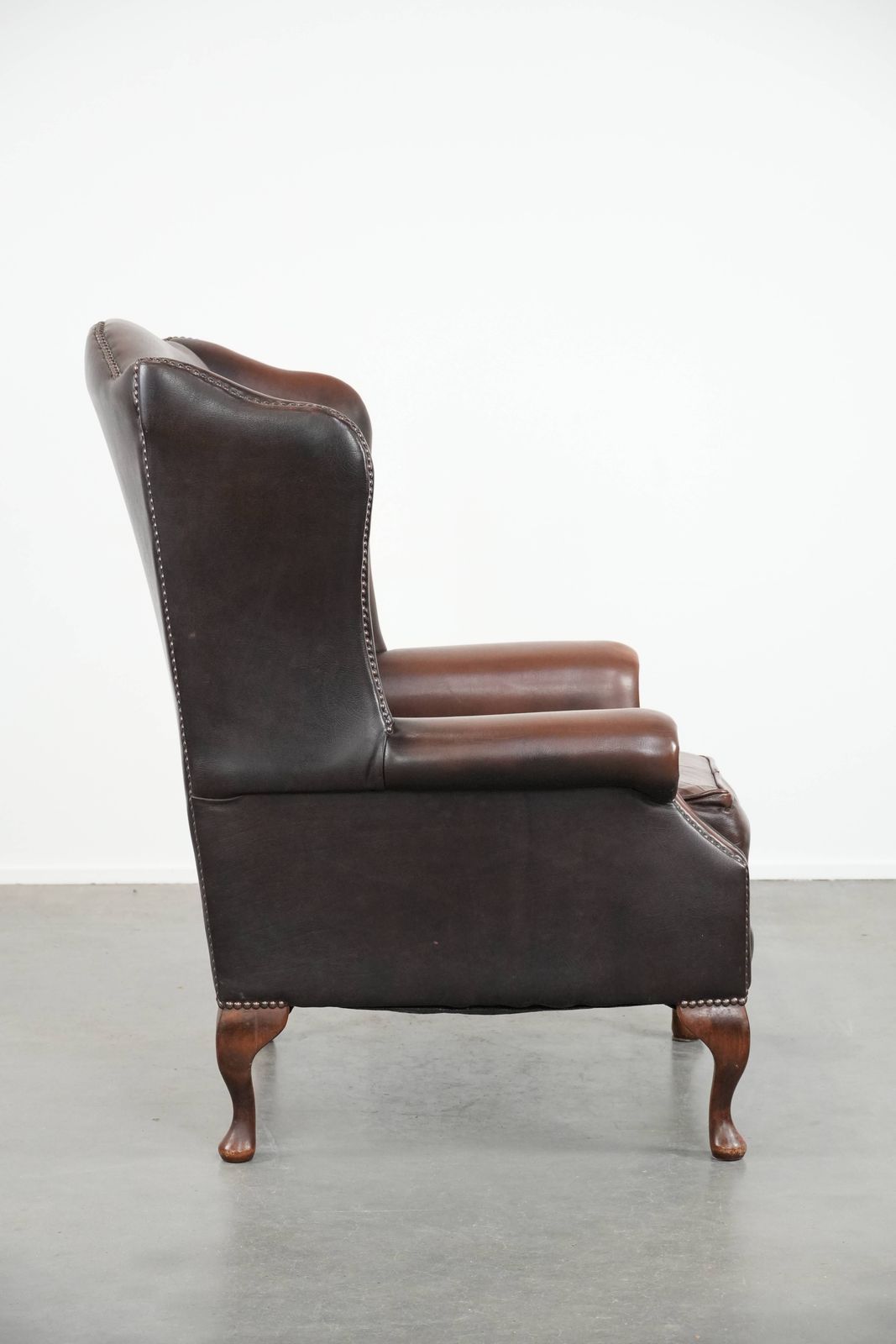 Nice Brown Smooth Cowhide Chesterfield Armchair In English Style Finished With Decorative Nails photo for sale