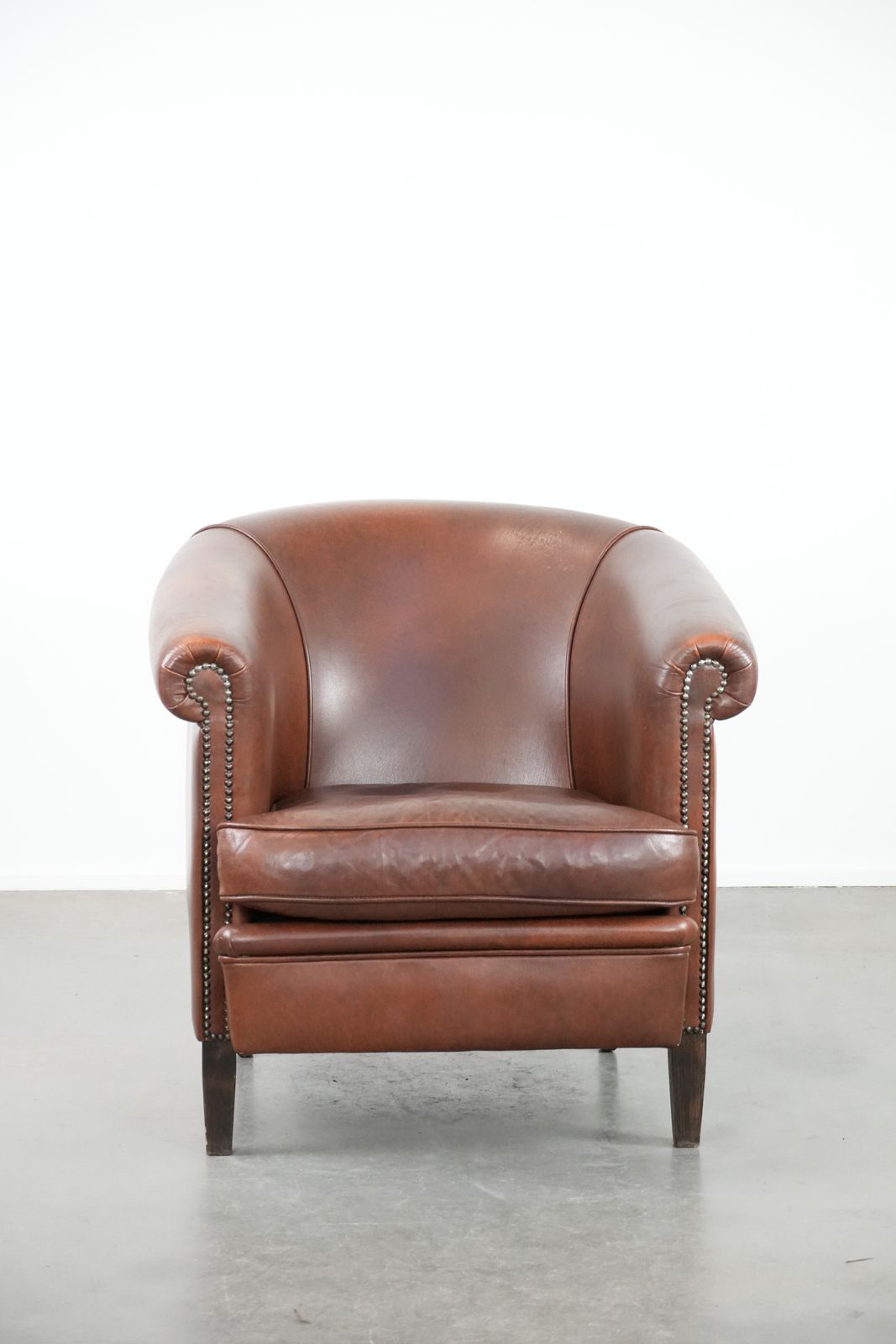 Cognac Colored Cowhide Club Armchair In English Style With A Luxurious Look photo furniture