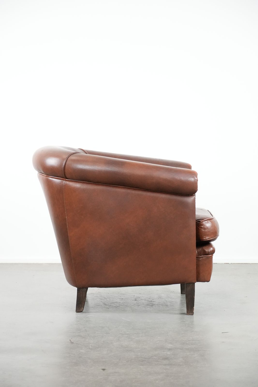 Cognac Colored Cowhide Club Armchair In English Style With A Luxurious Look photo for sale