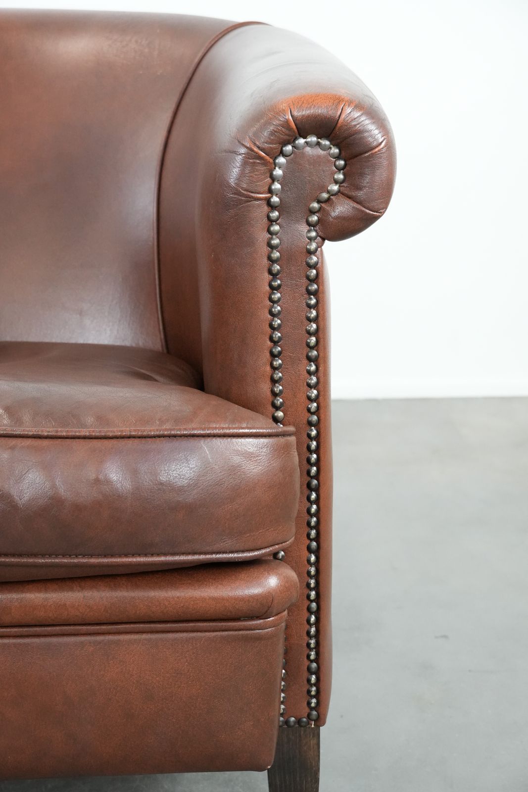 photo for sale Cognac Colored Cowhide Club Armchair In English Style With A Luxurious Look