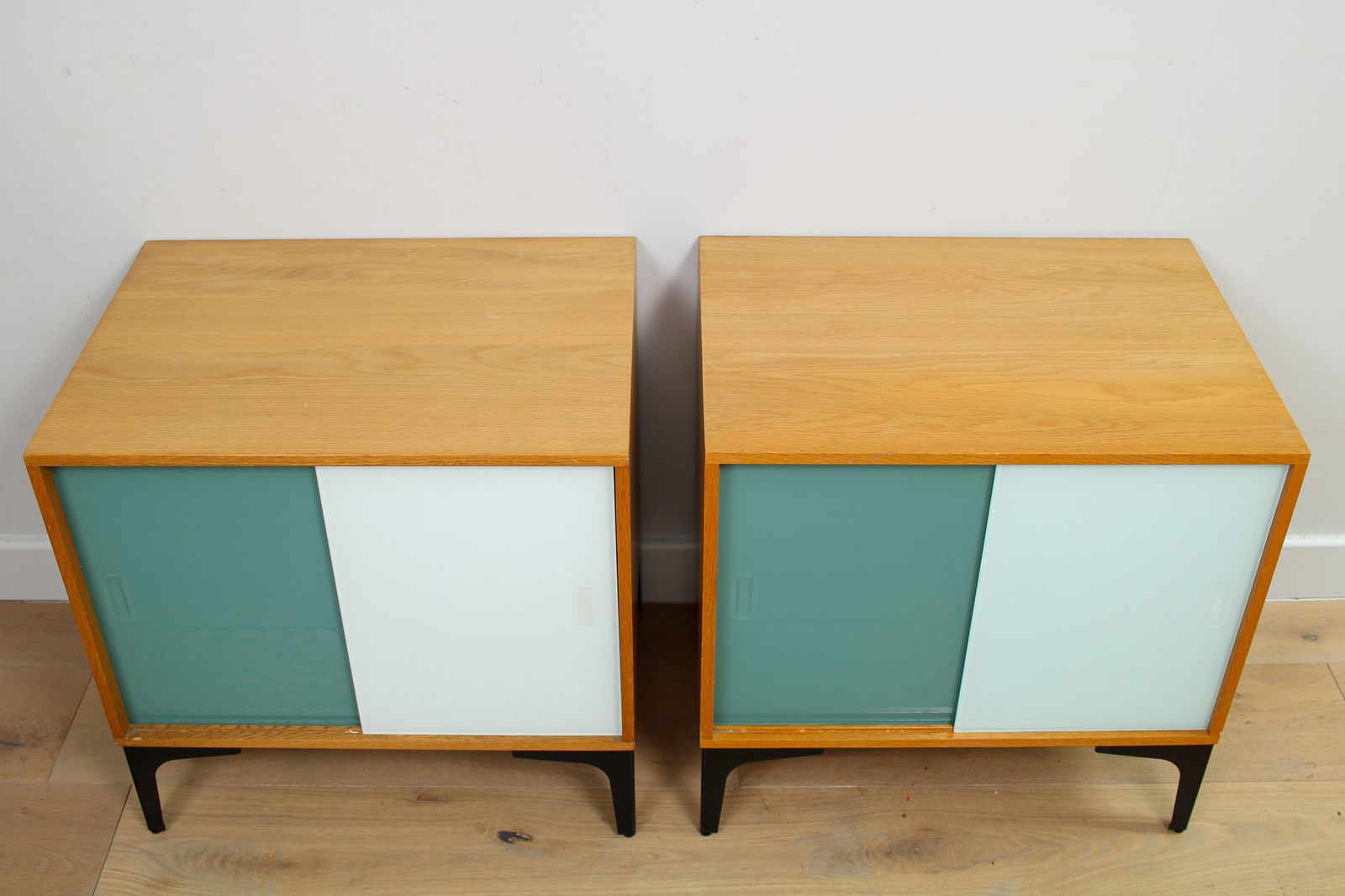 A Pair Of Vintage Mid Century Bedside Tables With Glass Sliding Doors photo buy