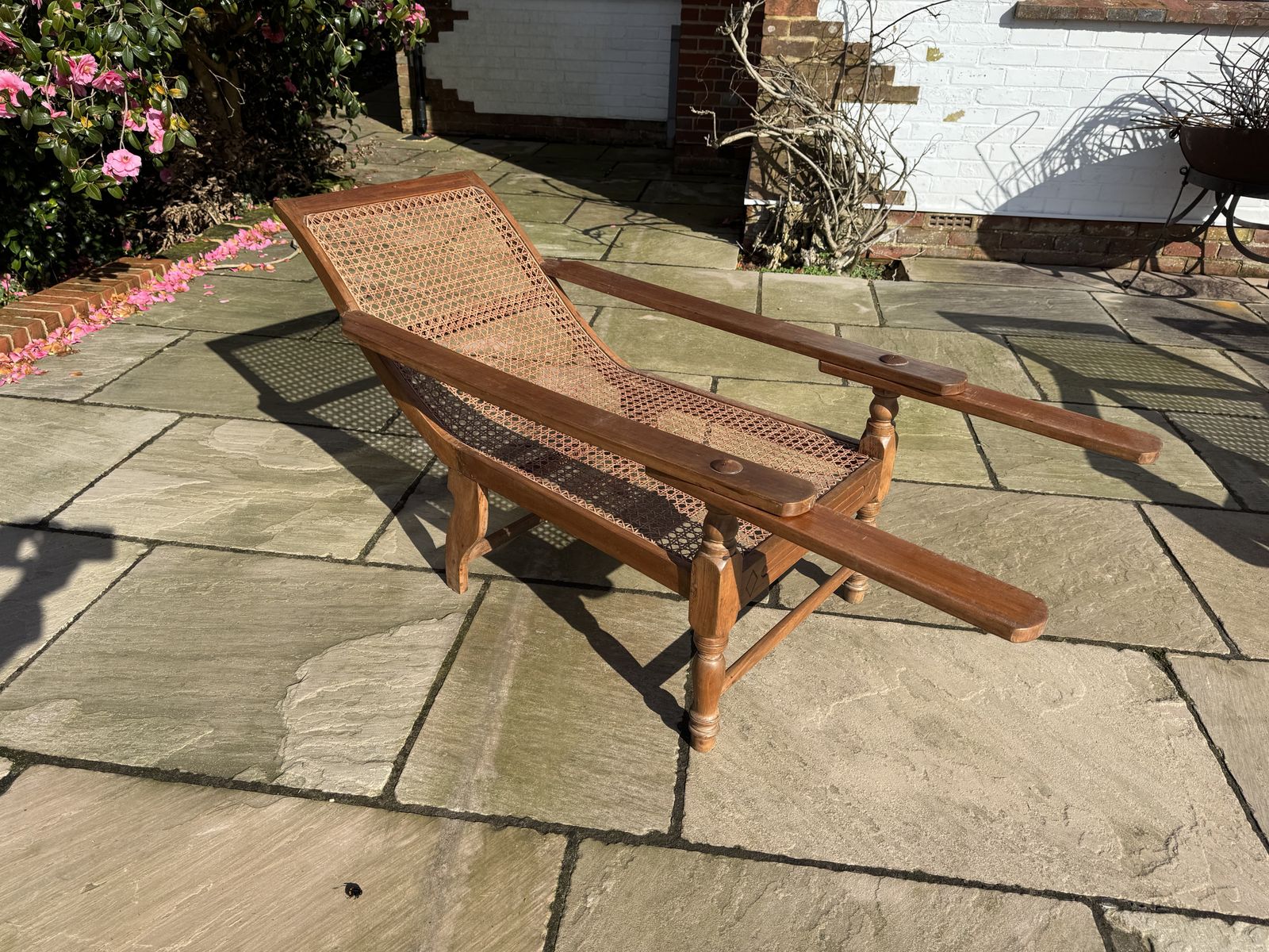 Late 19th Early 29th Century Teak Colonial Planter’s Chair With Rattan Weave photo for sale