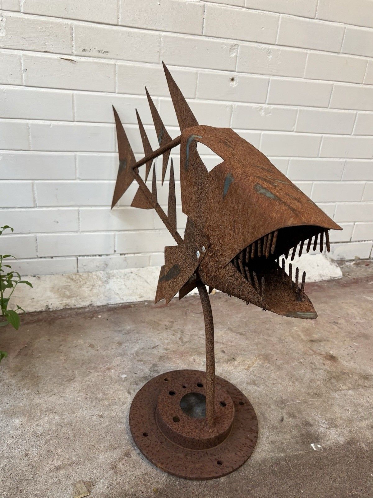 A Hand Made, One Of A Kind Scrap Metal Piranha Sculpture. photo vinterior