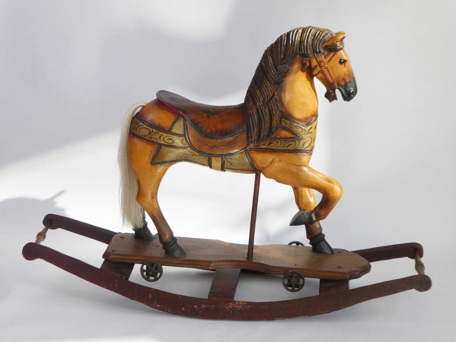 Large Old Wooden Rocking Horse With Glass Eyes, Carved Old Figurine On Wheels, Art Object photo for sale