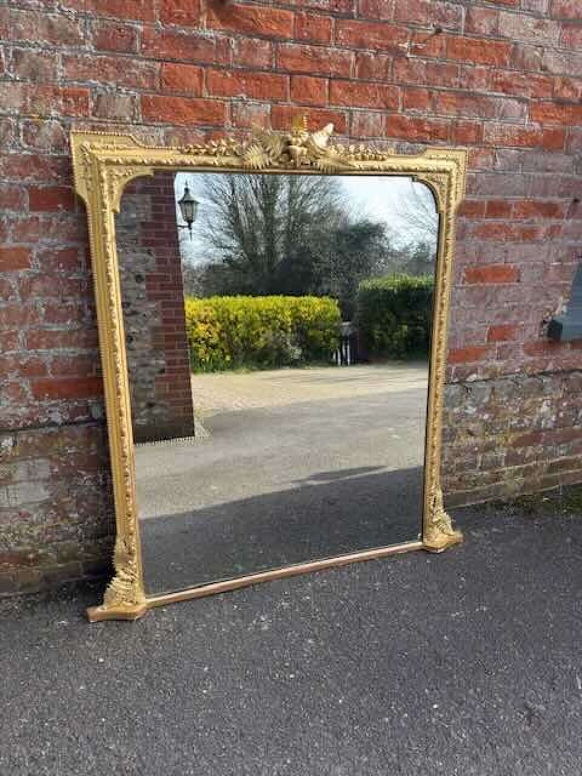 A Spectacular Large Antique English 19th Century Gilt Overmantle Mirror.