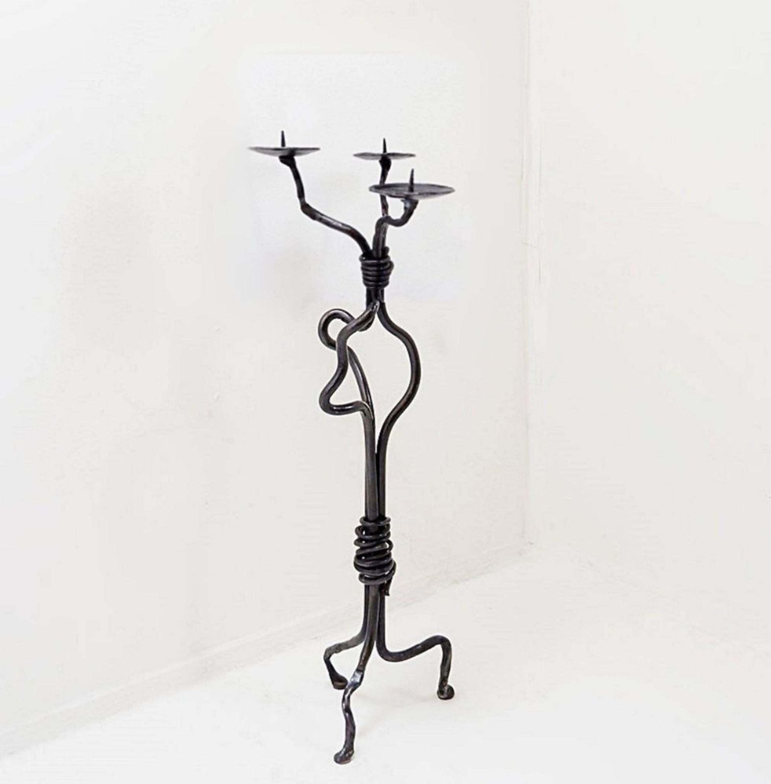 photo vintage Large Wrought Iron Candelabra With An Abstract Design And Three Candle Holders
