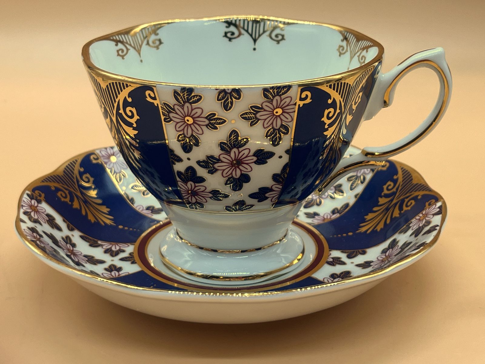 Royal Albert China 100 Years Regency Blue Design Tea Cup And Saucer Duo.