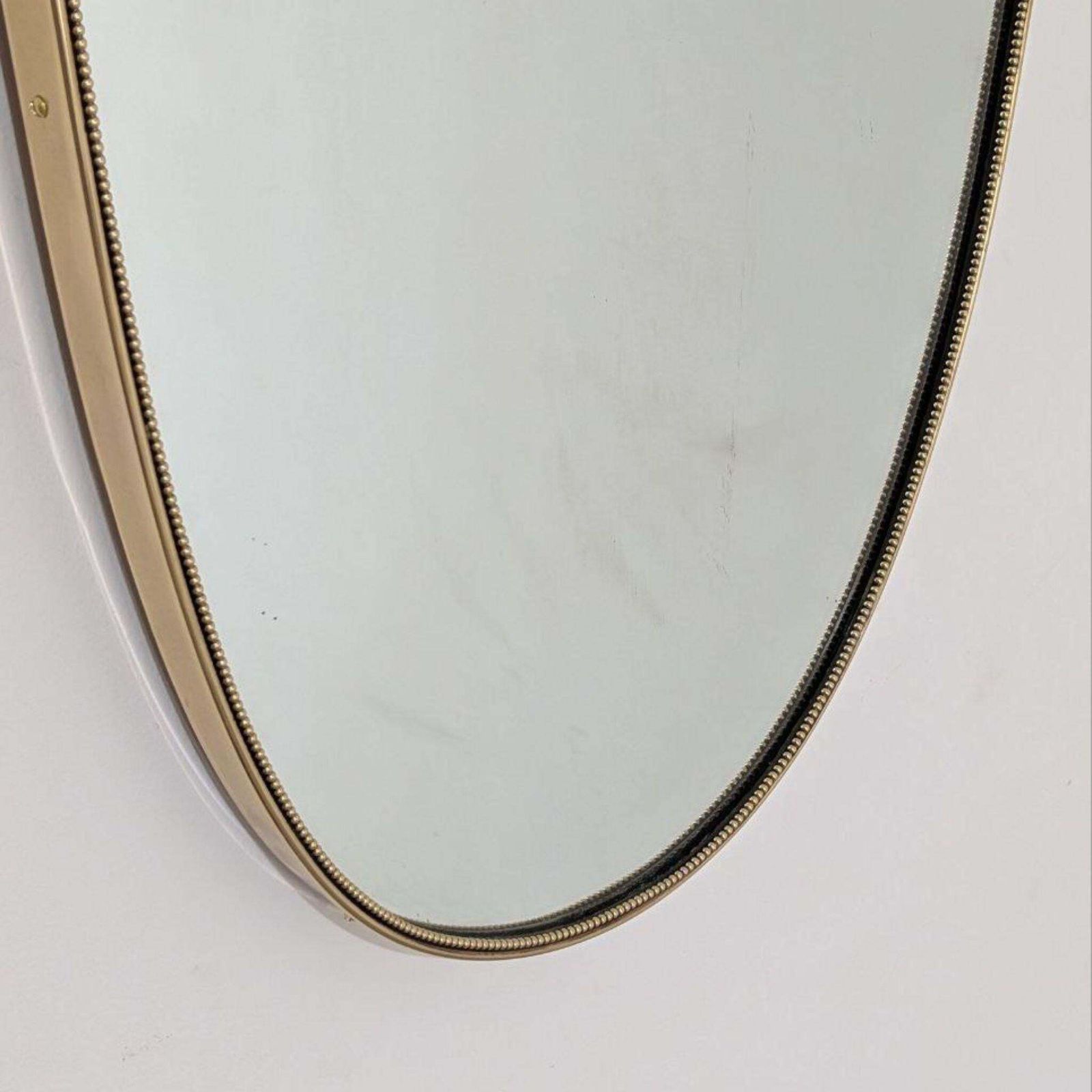 1950s Mid Century Modern Italian Brass Shield Shaped Mirror In The Style Of Gio photo furniture