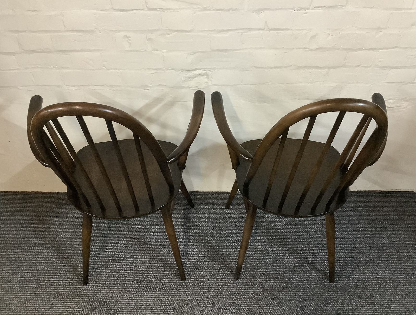 A Match Pair Of Ercol Windsor Quaker Back Carver Chairs. photo 450.0