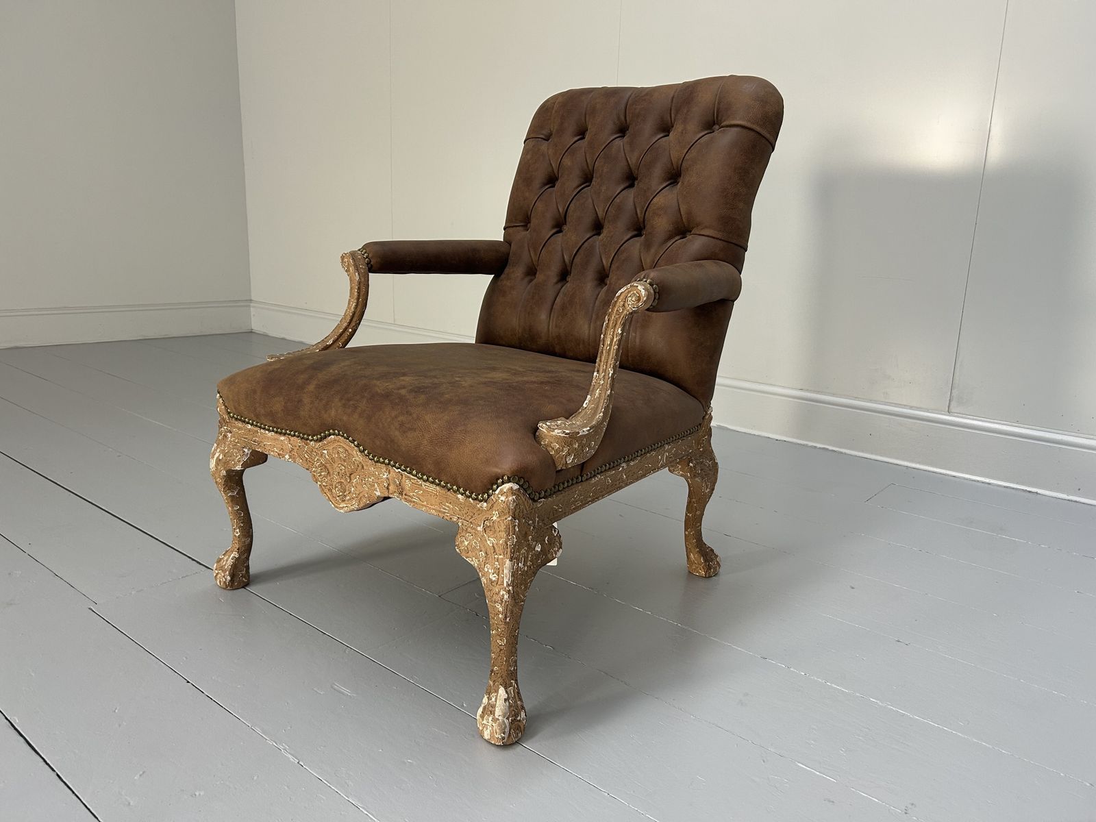 Andrew Martin Buttoned Back Armchair And Stool In Antiqued Brown Leather photo furniture