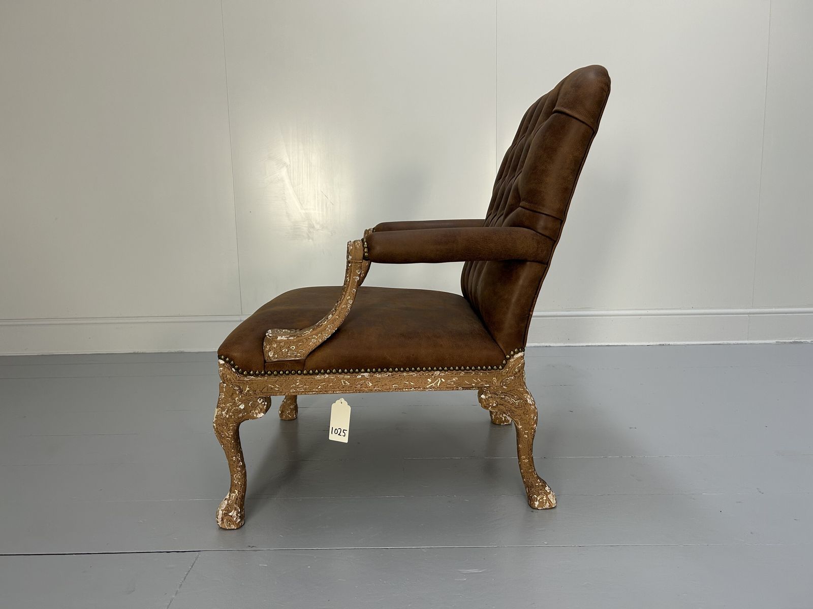Andrew Martin Buttoned Back Armchair And Stool In Antiqued Brown Leather photo 800.0