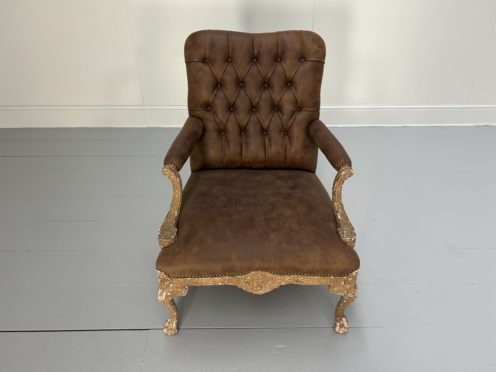 Andrew Martin Buttoned Back Armchair And Stool In Antiqued Brown Leather photo vinterior