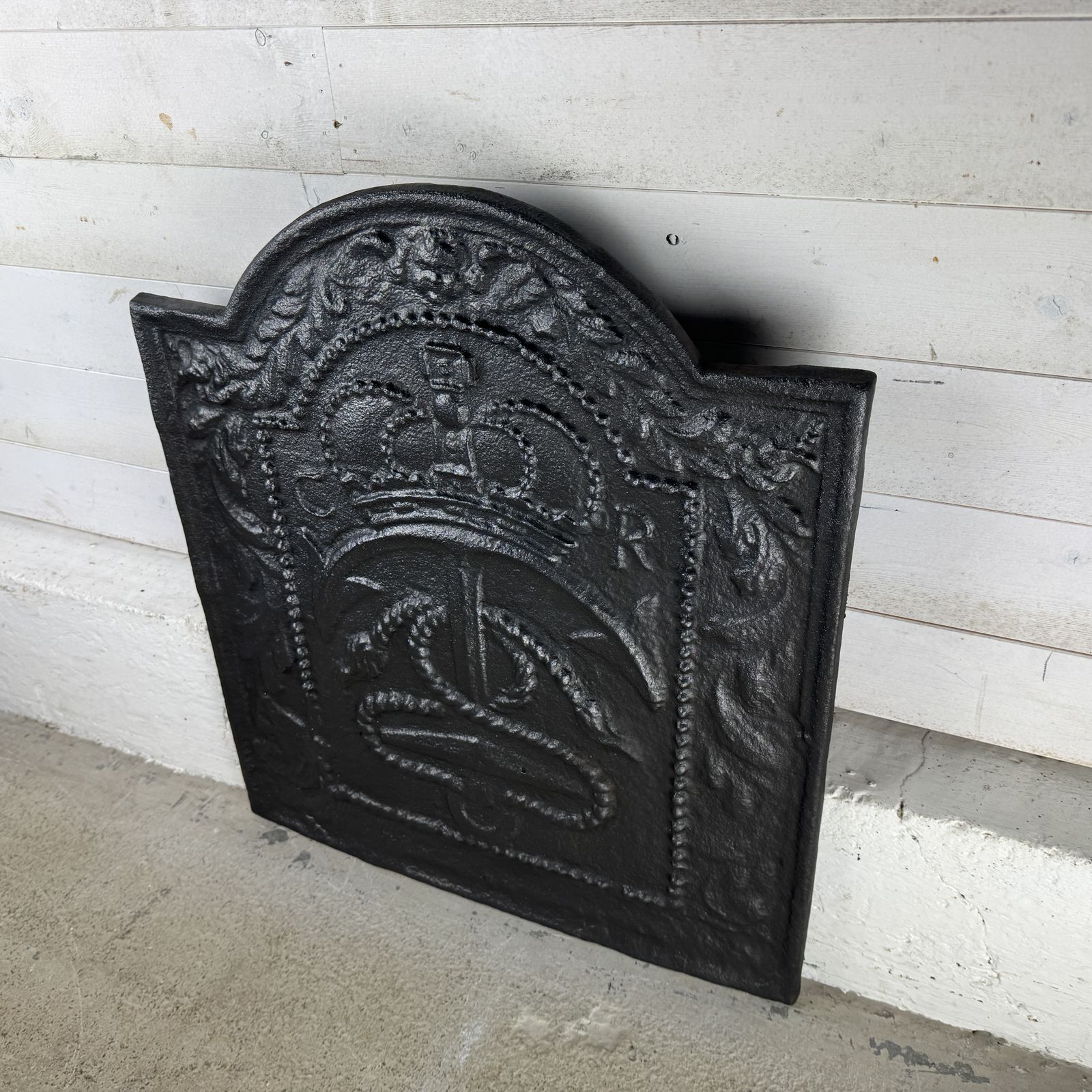 Antique Cast Iron Fire Back With Anchor Design photo for sale