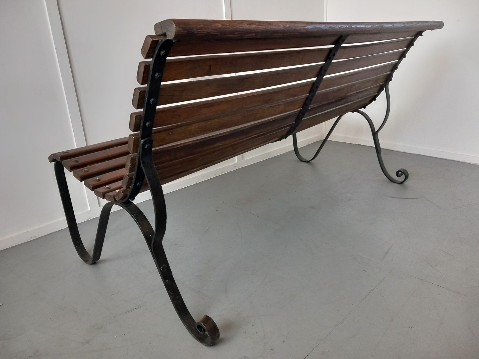 A Wrought Iron Garden Bench, 1900s photo for sale