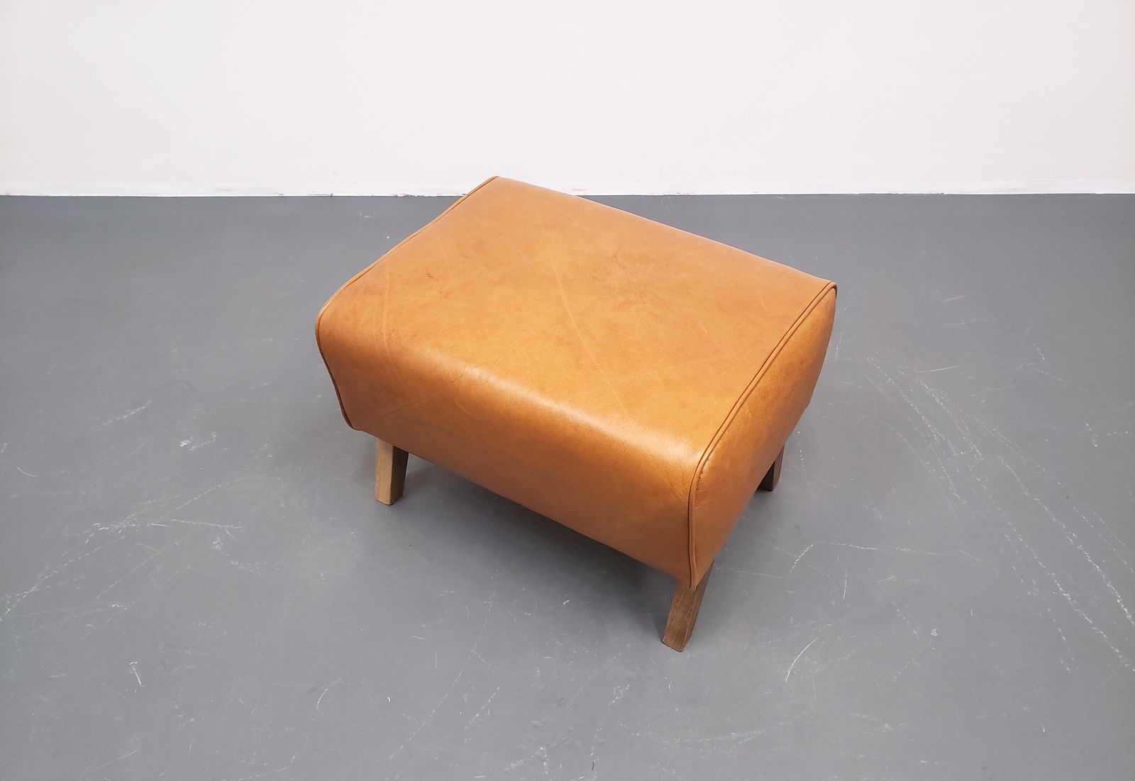 Livian Ottoman In Premium Tan Leather photo furniture