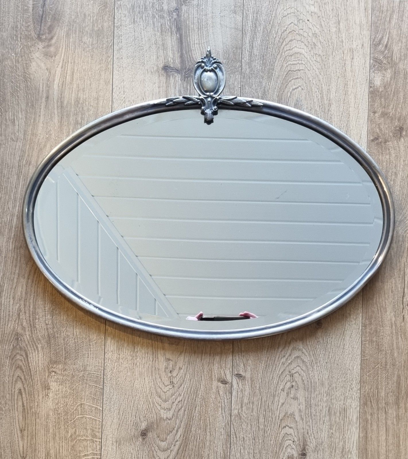 Early 20th Century Oval Silver Tone Metal Mirror Ornate Crest Bevelled Edge