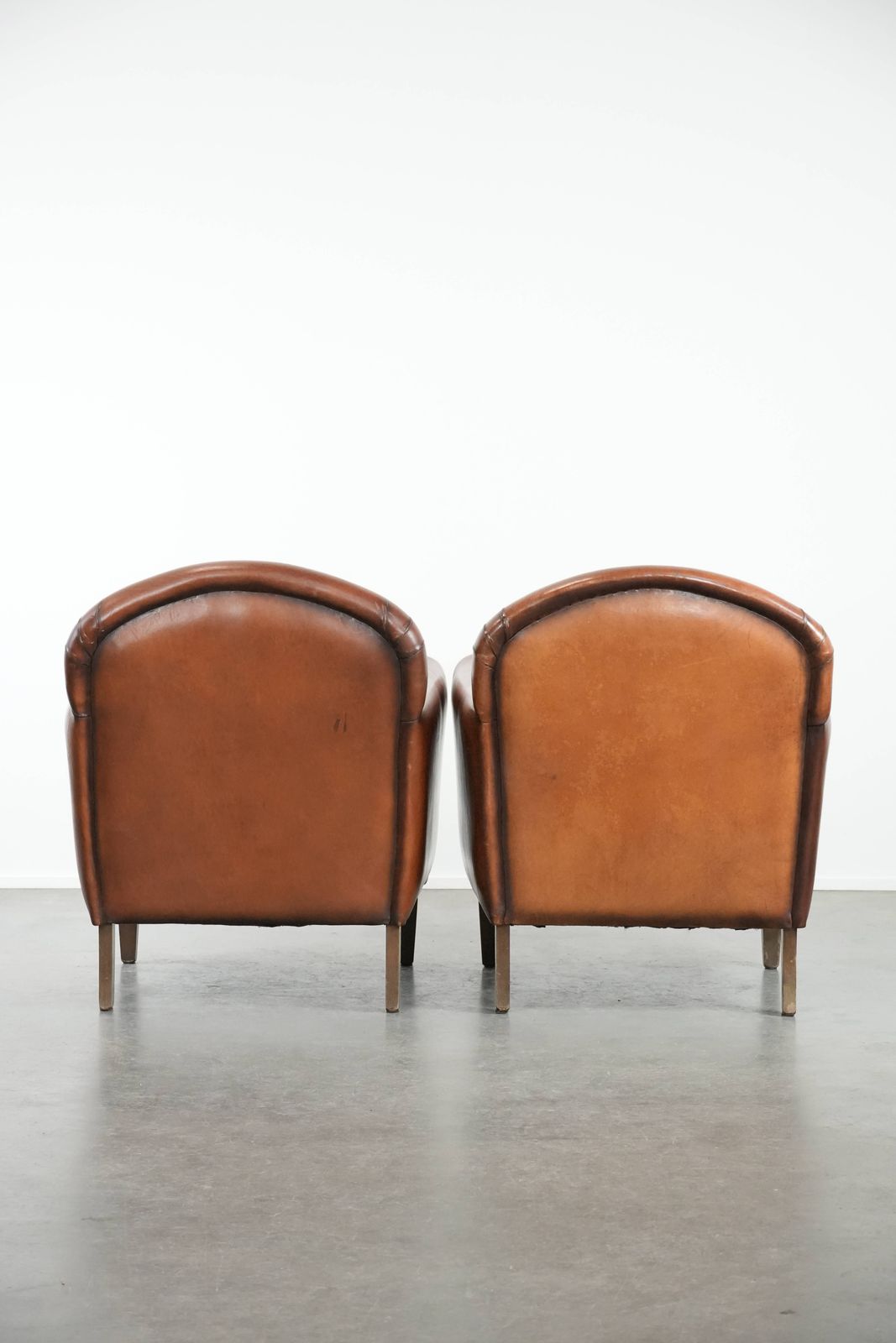 Set Of 2 Beautifully Shaped Sheep Leather Art Deco Design Armchairs With Timeless And Warm Colors photo for sale