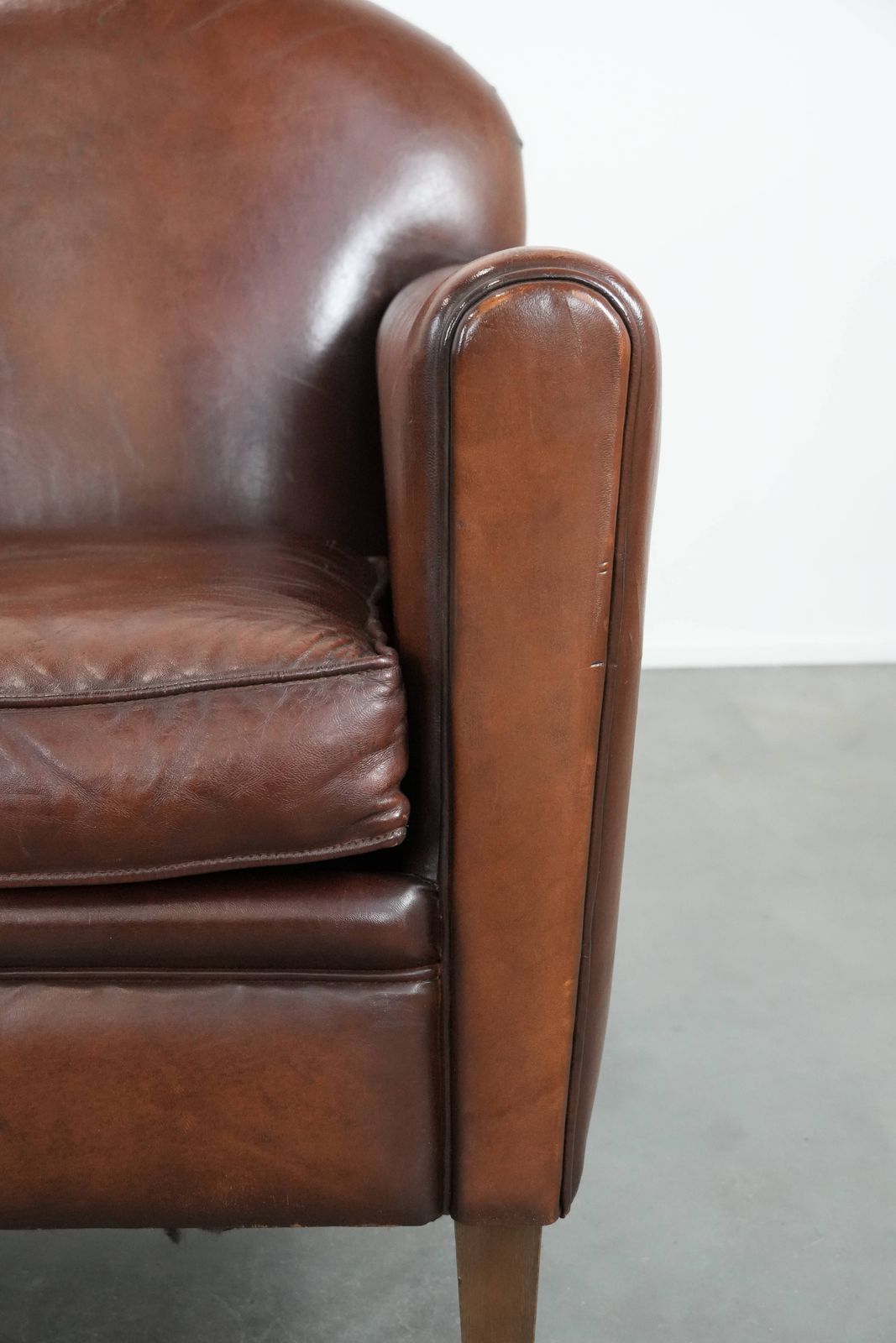 photo furniture Armchair Made Of Beautifully Shaped Sheep Leather In Art Deco Design With Timeless And Warm Colors
