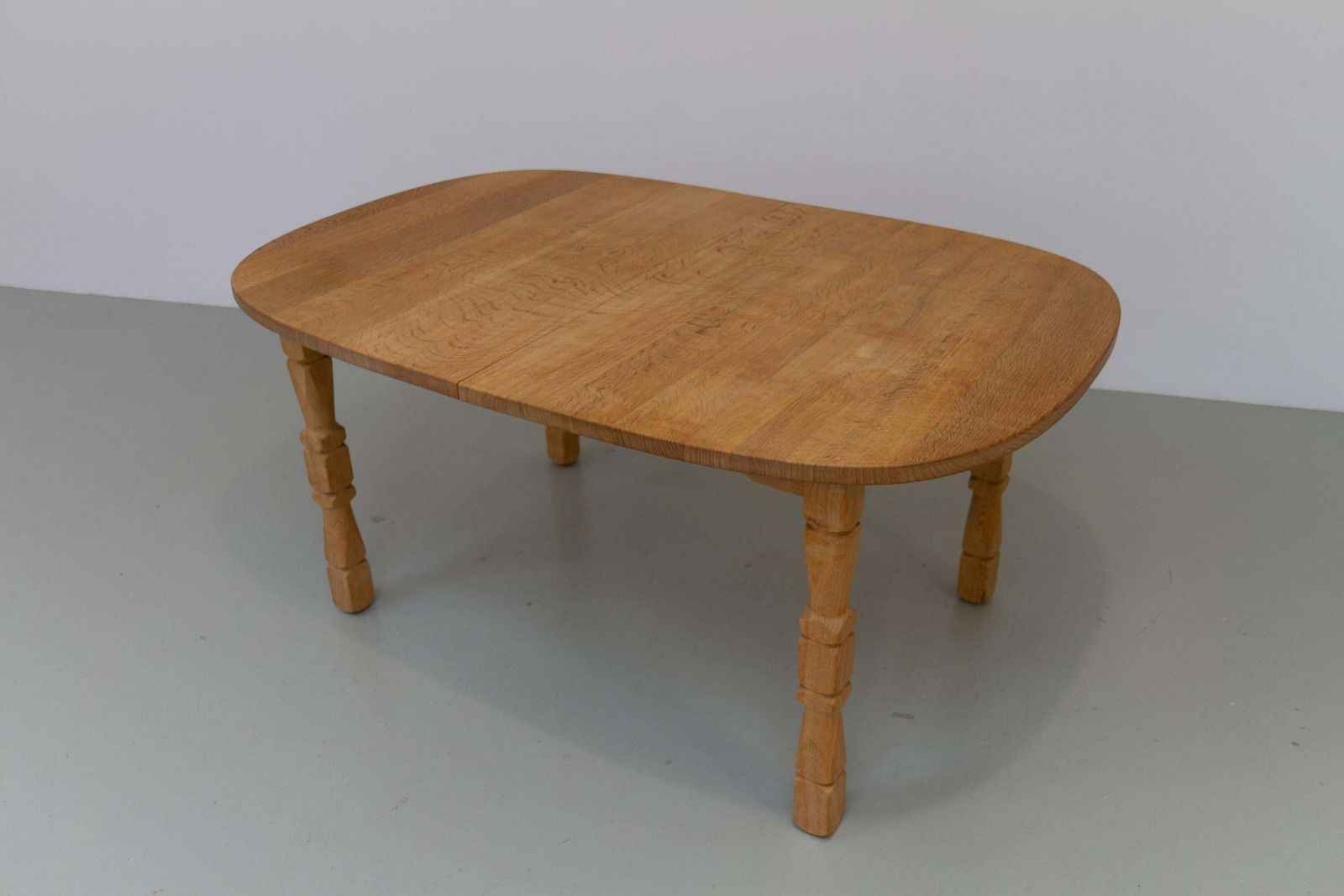 photo for sale Danish Brutalist Oak Extendable Dining Table By Henning Kjærnulf, 1970s.