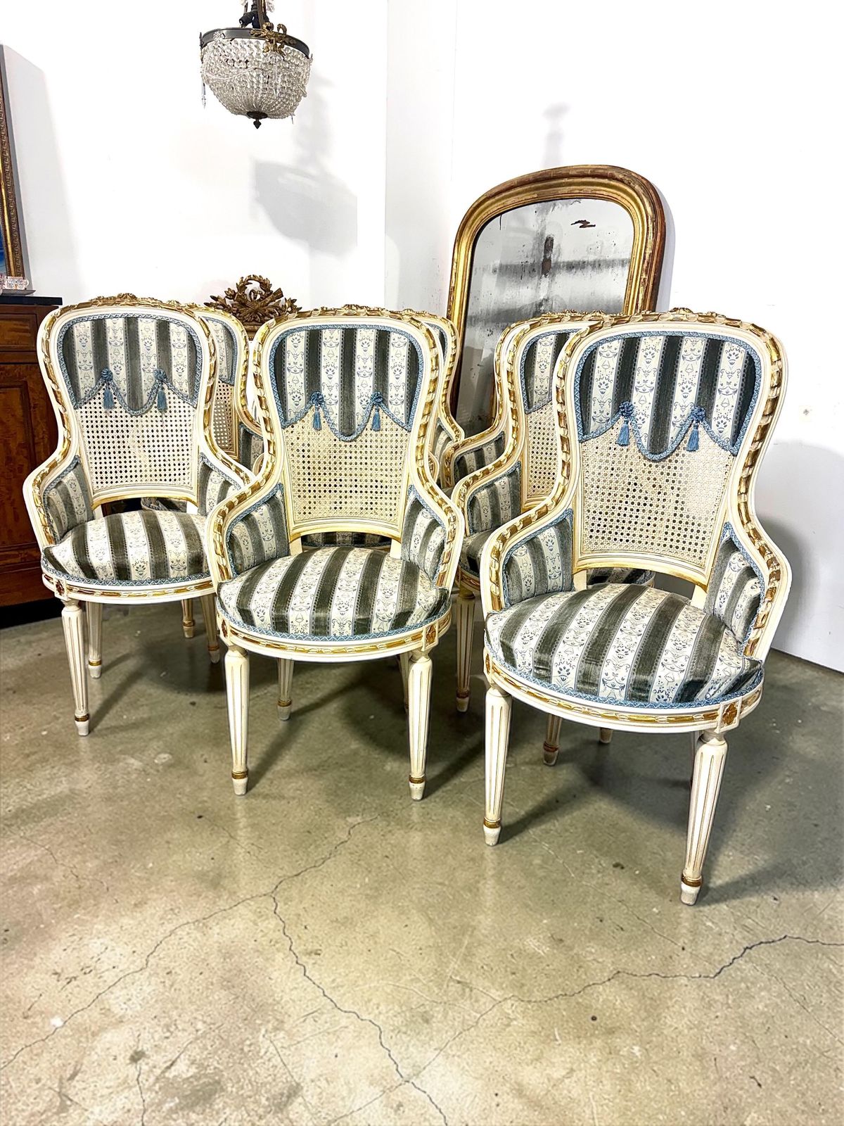 photo furniture Set Of Eight French Louis XVI Style Painted & Gilt Dining Chairs, Caned Backs