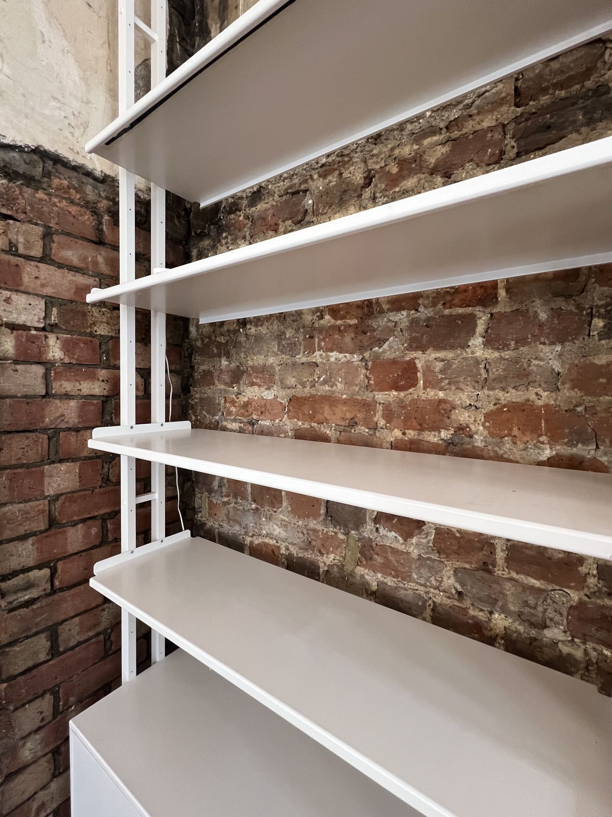 Tension Pole Shelving Unit With Storage photo Furniture