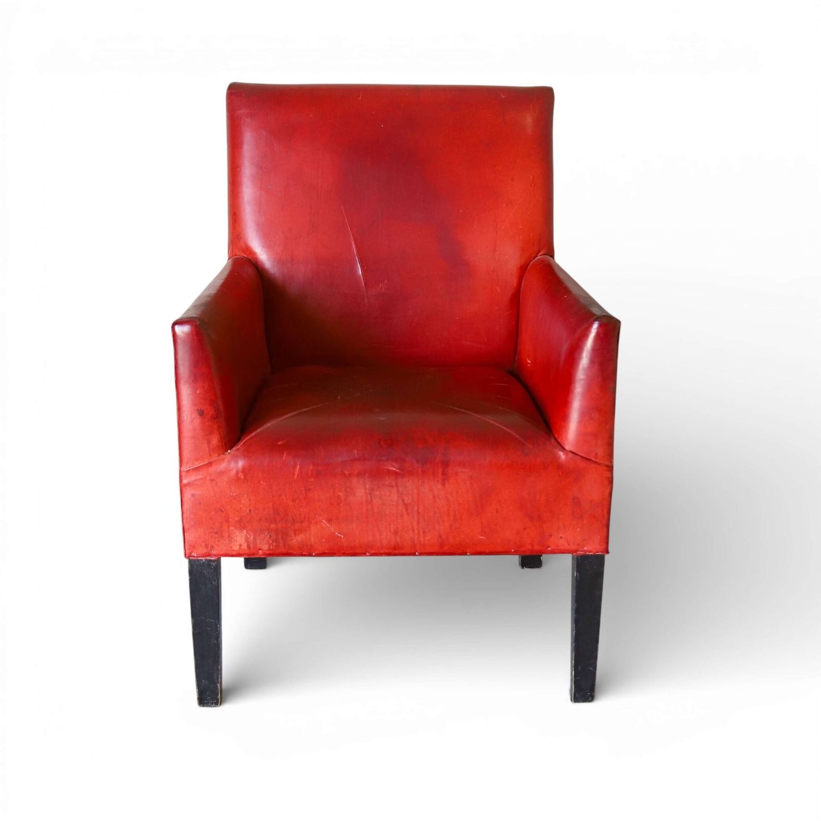Mid 20th Century Red Leather Armchair On Ebonised Legs – Vintage Character & Comfort