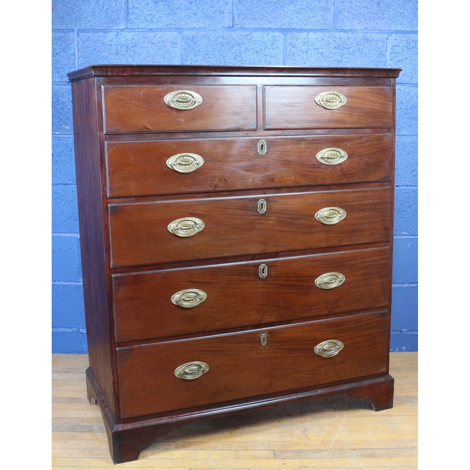 A Large Georgian Oak & Mahogany Two Over Four Graduated Chest Of Drawers