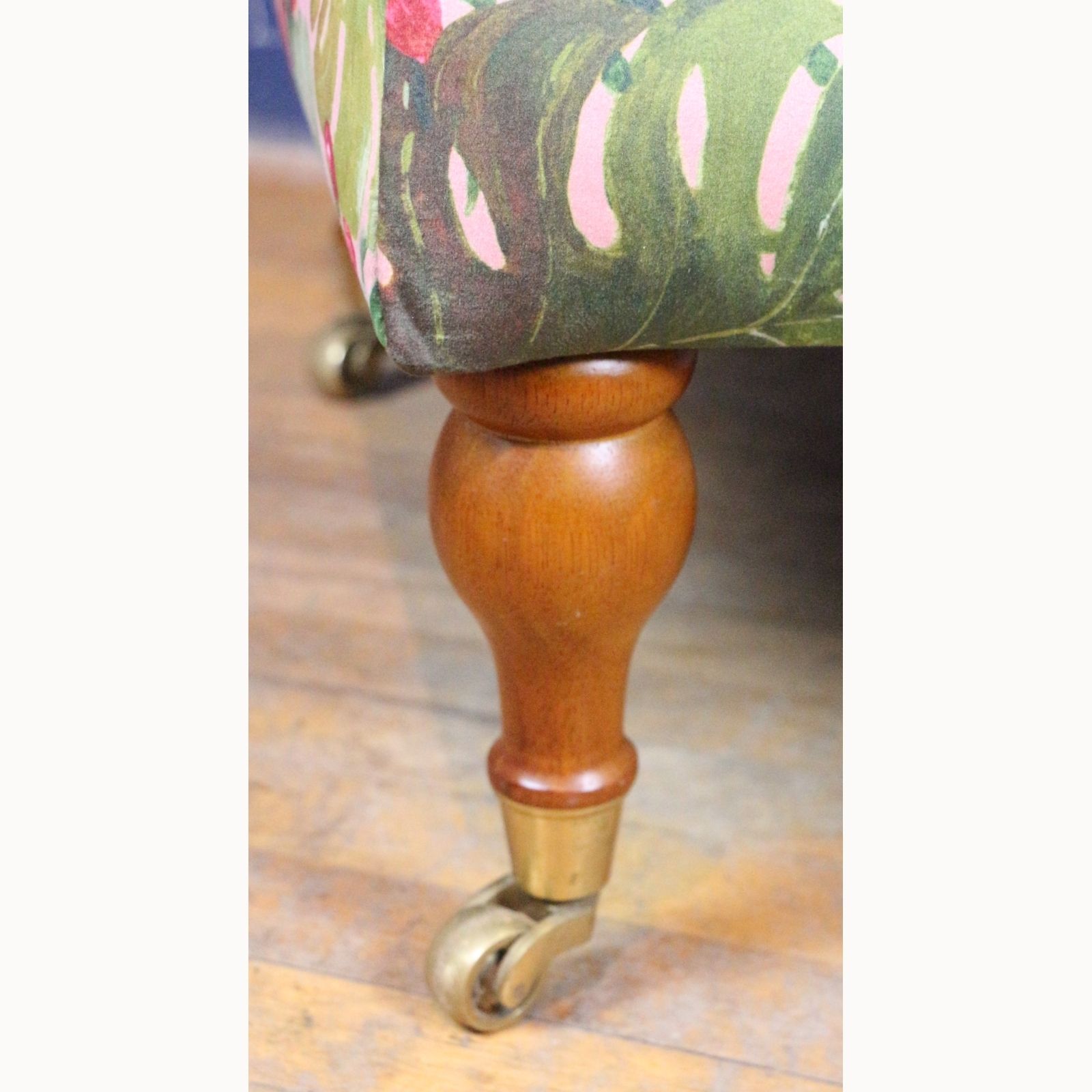 A Large Square Footstool Or Ottoman, Reupholstered In Stylised Material Raised On Turned Supports photo vinterior
