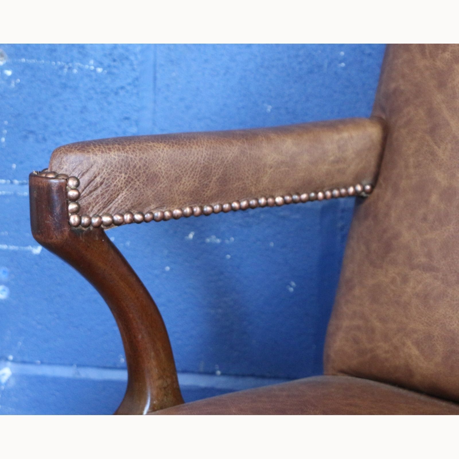 An Antique Mahogany Library Chair Upholstered In Brown Leather photo 550.0
