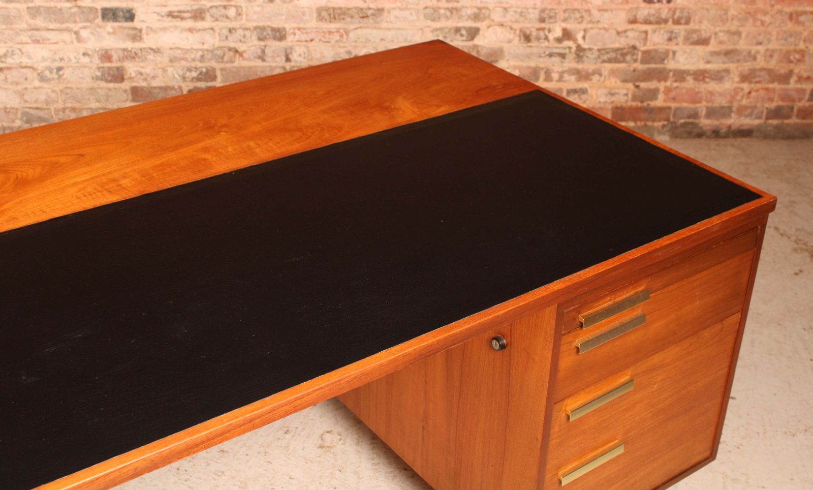 950.0 British Mid Century Executive Teak Desk With Brass Handles, Circa 1970s photo
