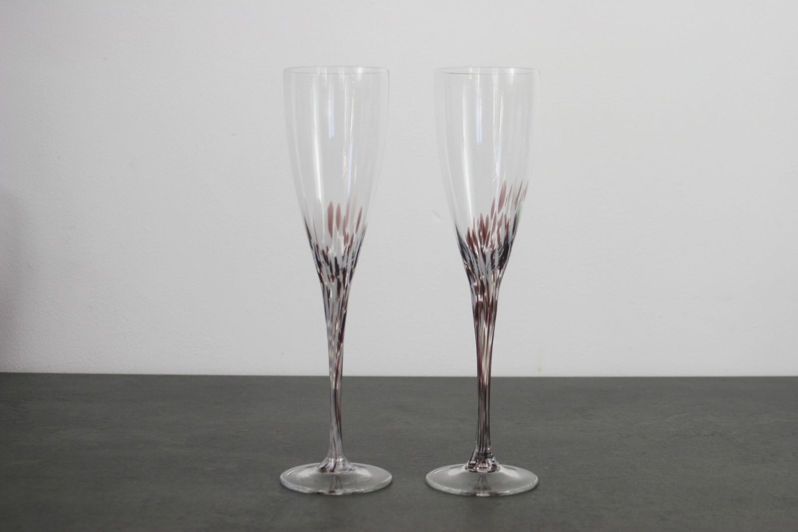 A Set Of Splatter Glass Champagne Flutes photo for sale