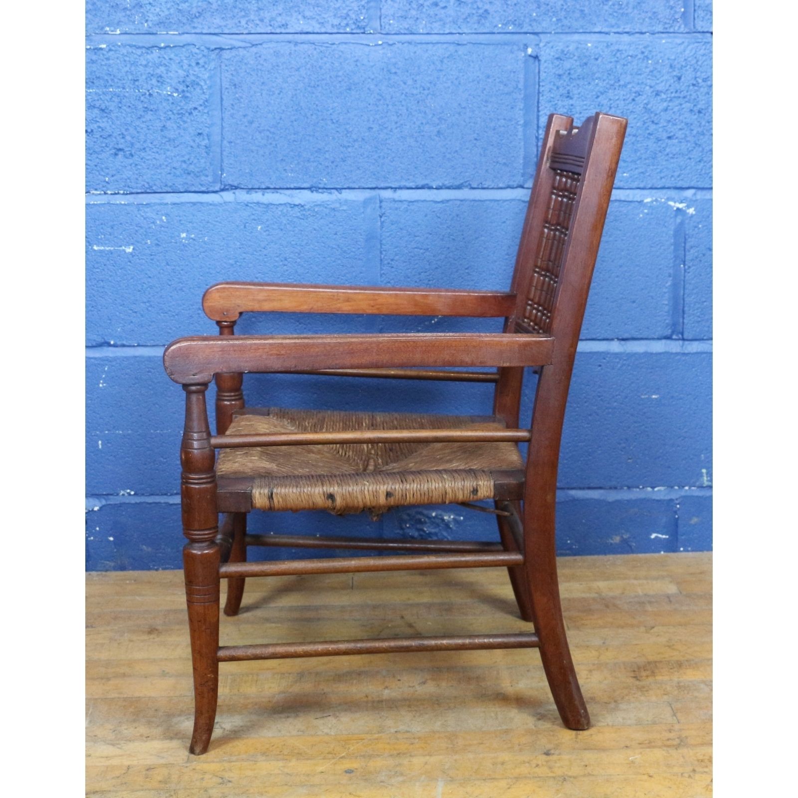 A Victorian Turned Mahogany And Rush Based Childs Low Open Armchair, Doll Or Teddy Display photo for sale