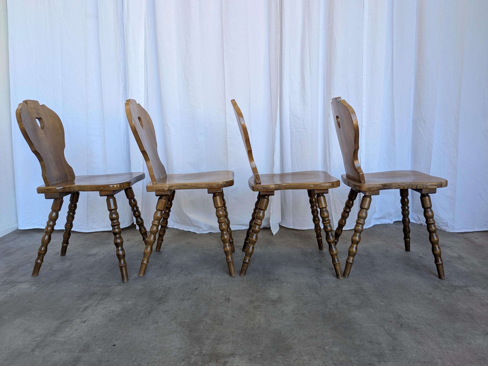 photo furniture Set Of 4 Vintage Tyrolean Heart Cutout Wooden Dining Chairs / Darker Brown Wood