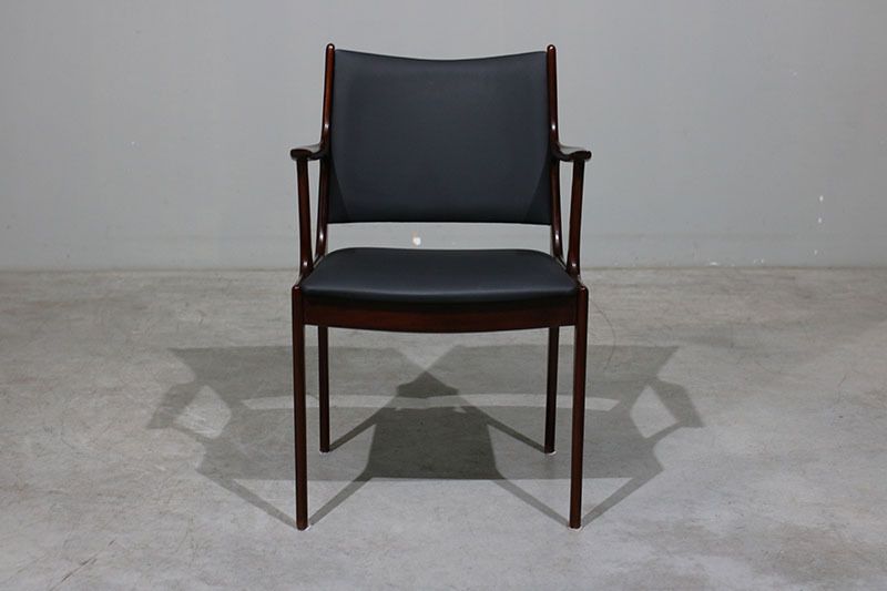 Johannes Andersen Armchair In Mahogany. photo furniture