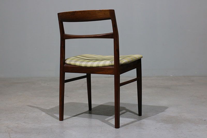 photo furniture Set Of 4 Henning Kjaernulf Chairs In Rosewood.