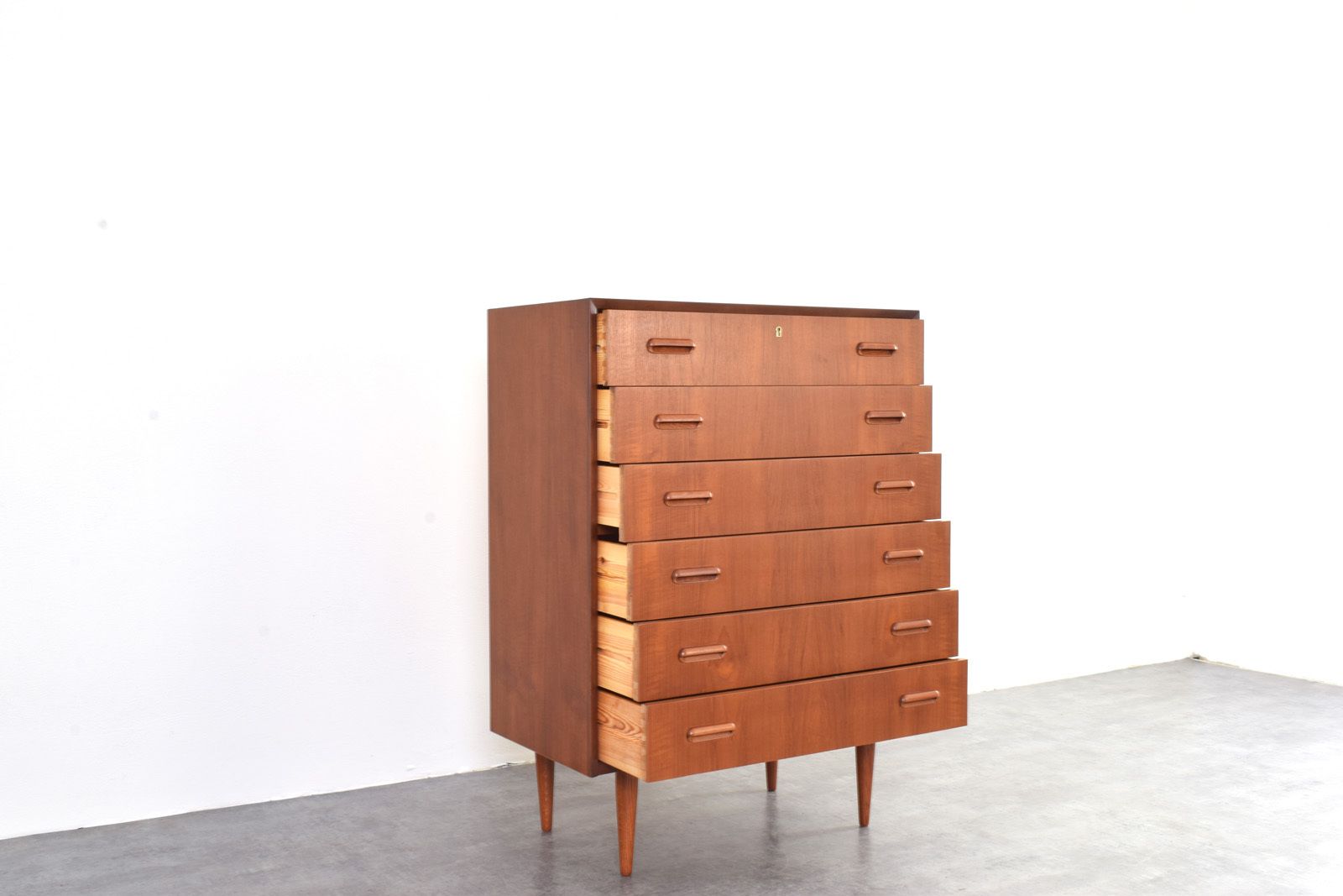 photo furniture Mid Century Danish Teak Chest Of Drawers, 1960s.
