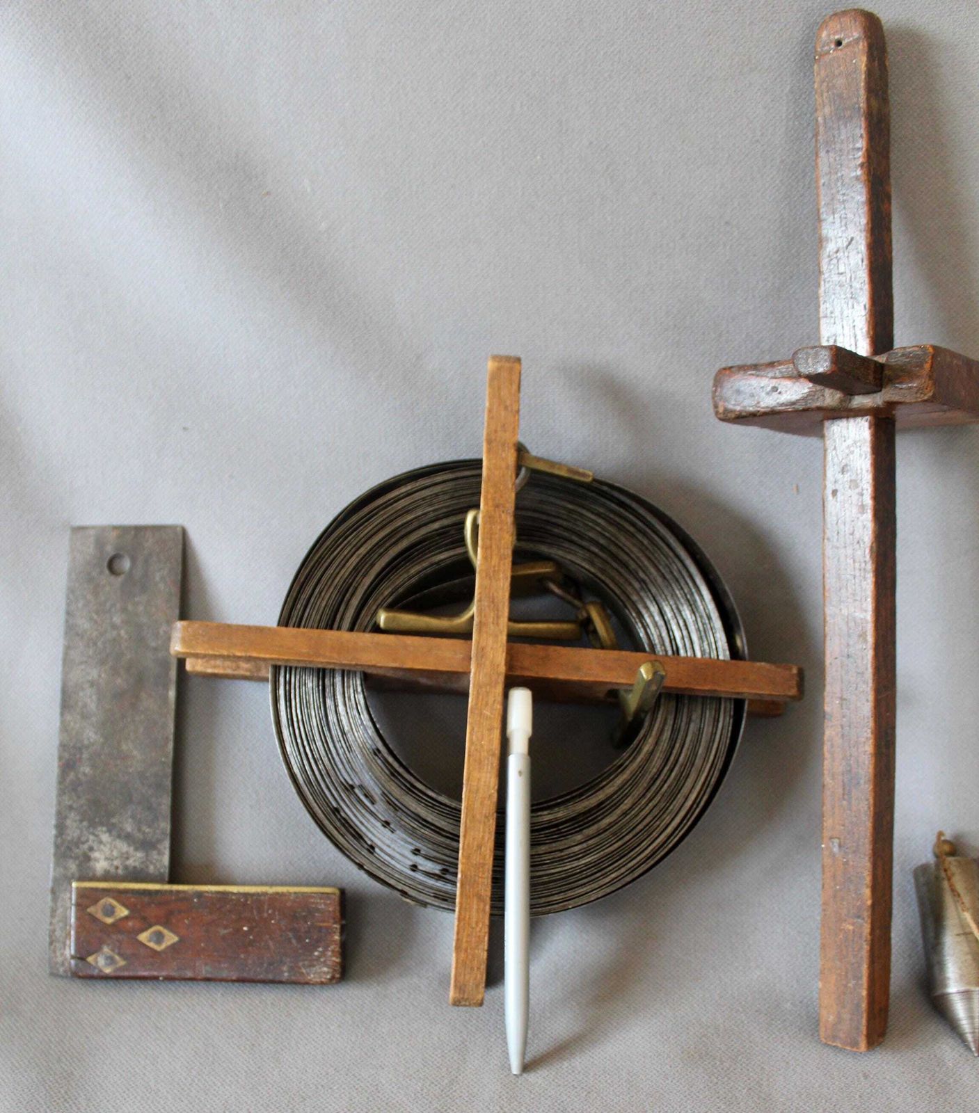 Set Of Four Antique Wood Tools, Surveyor Coiled Steel Tape Measure With Brass, A Scribe Marking Gauge, Square With Inlay, Metal Plumb Bob, photo furniture