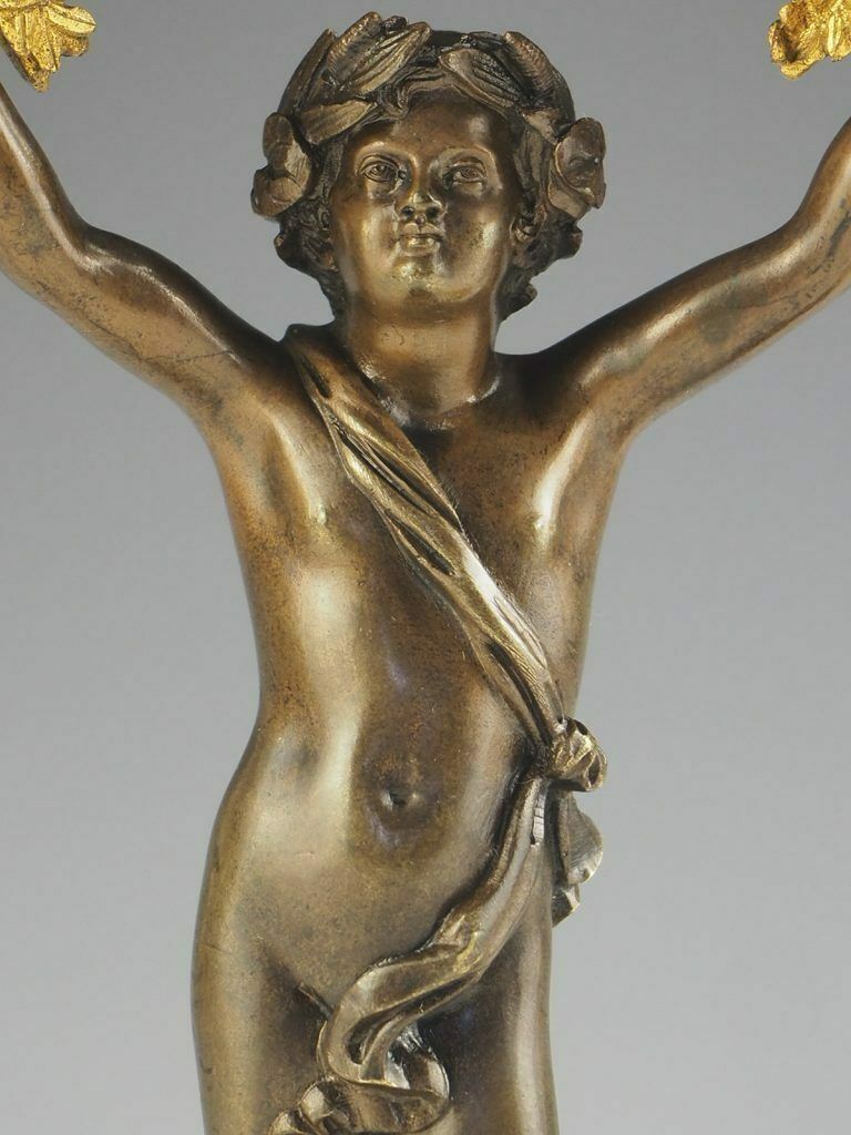 photo furniture Pair Of 19th Century Bronze And Ormolu Twin Light Cherub Candelabra