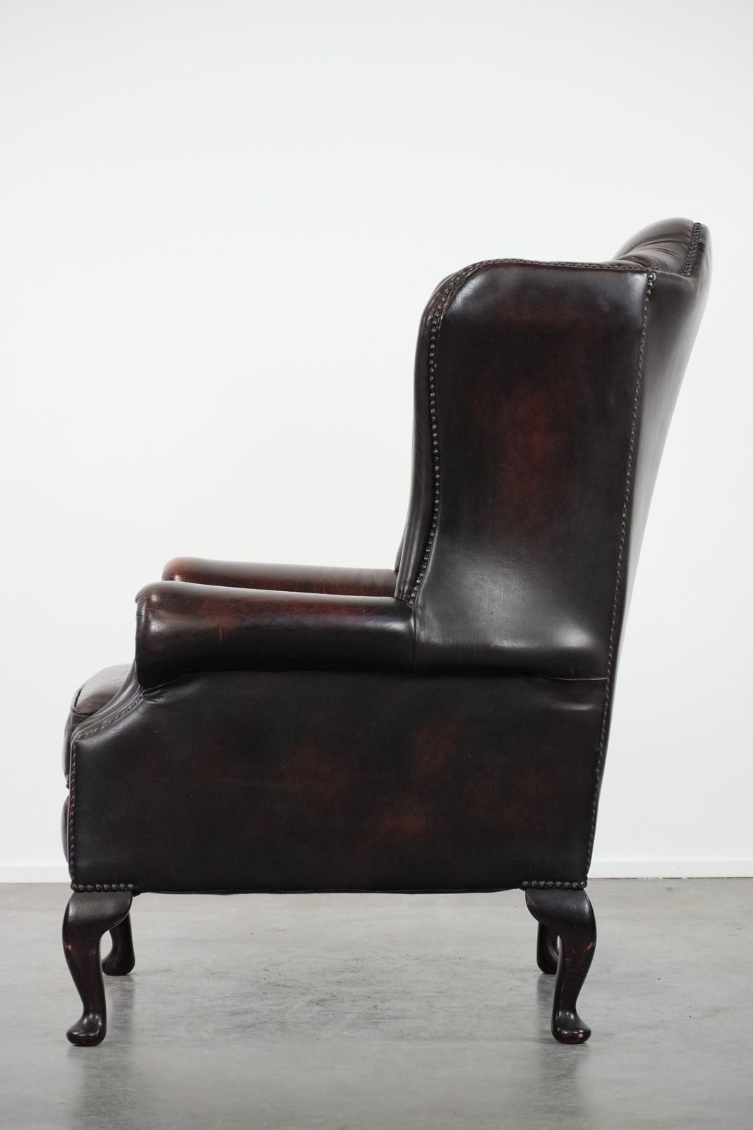 Beautiful, Luxurious, And Comfortable Brown Cowhide Chesterfield Wing Armchair In A Classic English Style. photo 894.0