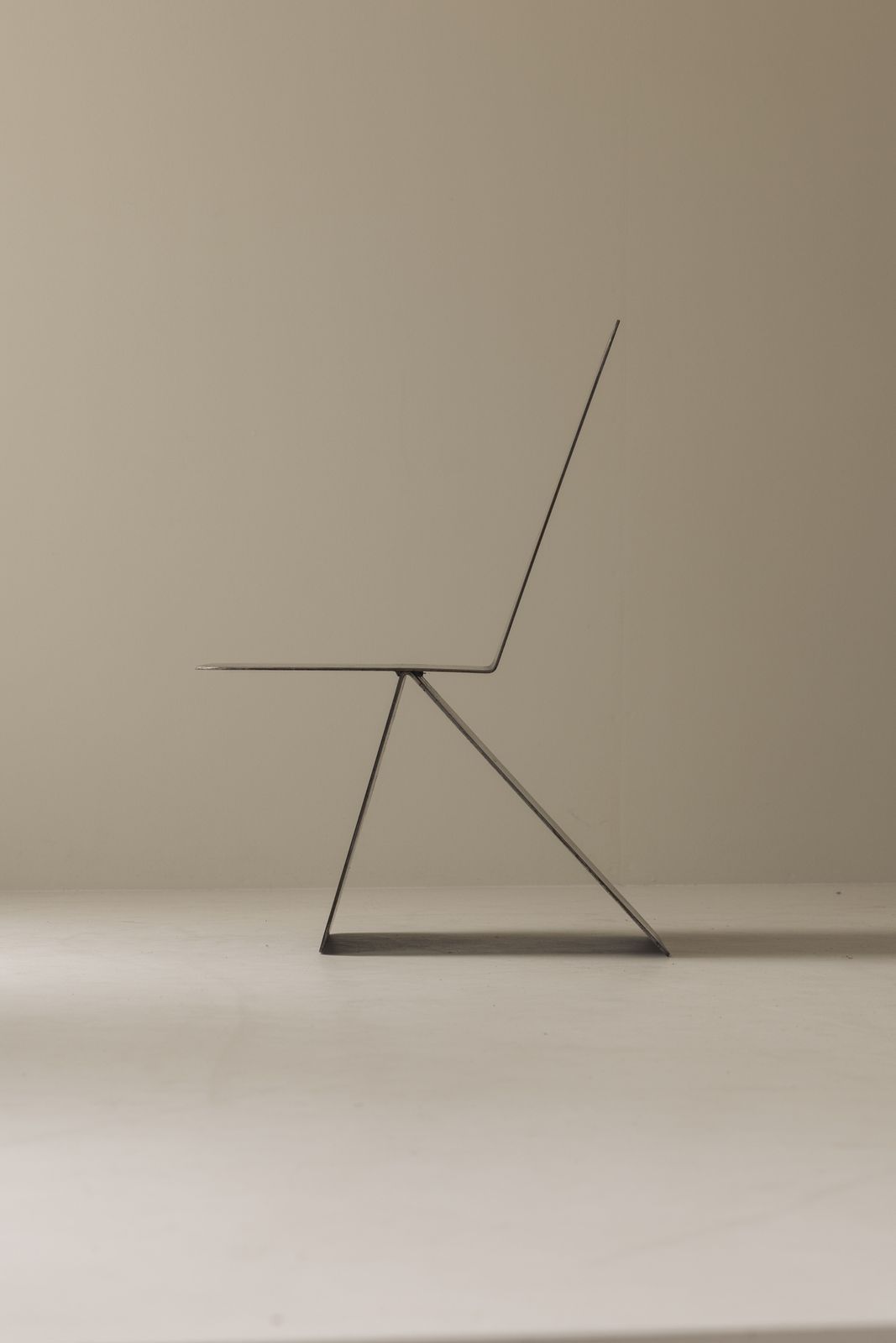 Striking Modernist Metal Chair From The 1980s, Executed In Folded Sheet Steel. photo furniture