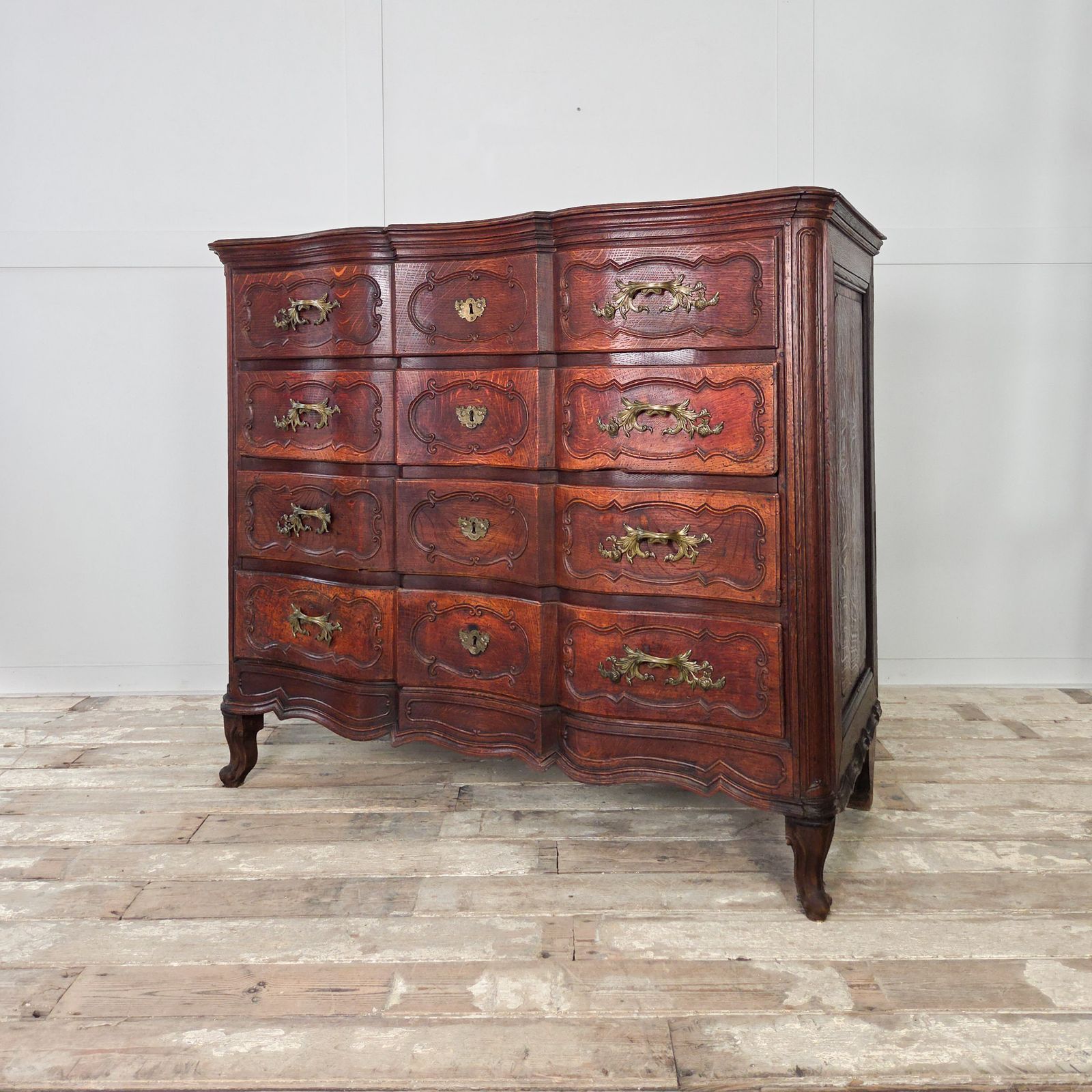 photo furniture Antqieu French Serptentine Chest Of Drawers