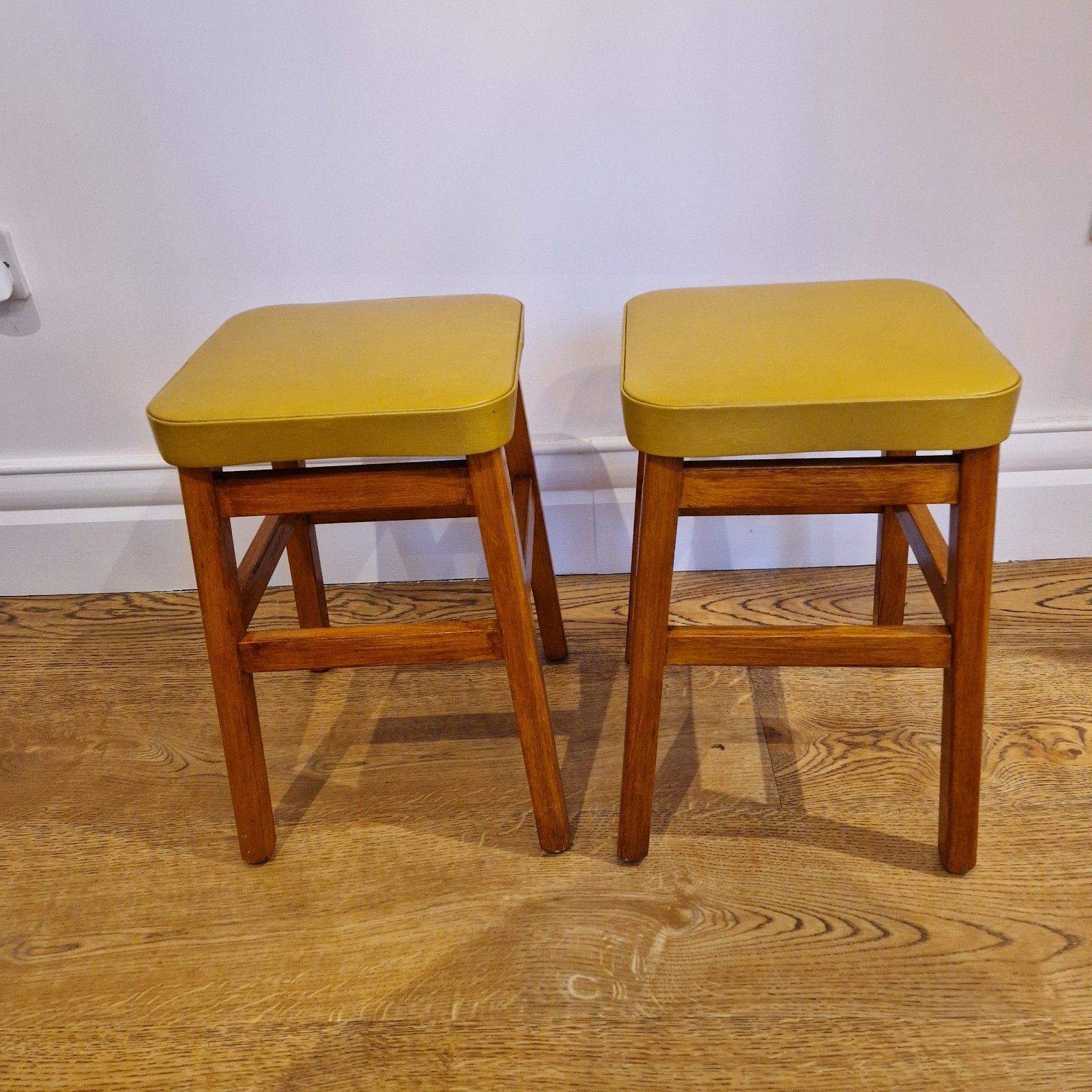 photo furniture Vintage Mid Century Beech Wood Stools With Yellow Vinyl Seats – Set Of 2