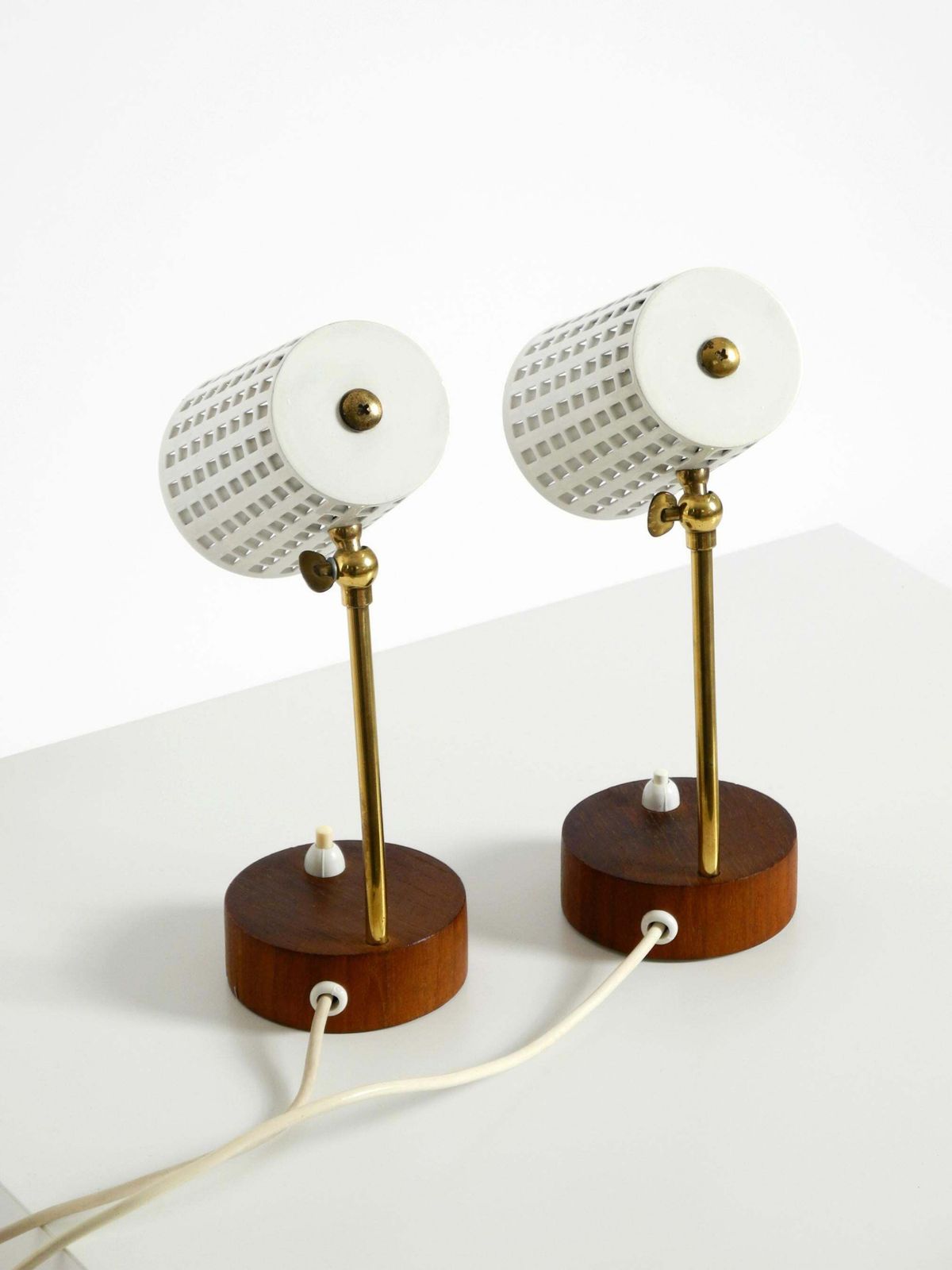 Lighting A Pair Of Beautiful Mid Century Modern Bedside Lamps With Perforated Metal Shade photo