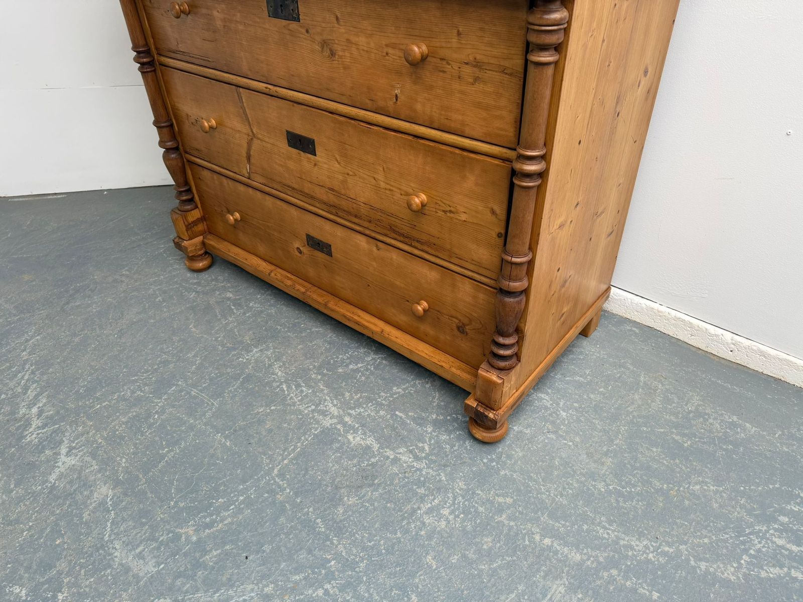 An Original Antique Pine Columned Hungarian Waxed 5 Drawer Chest Of Drawers photo for sale